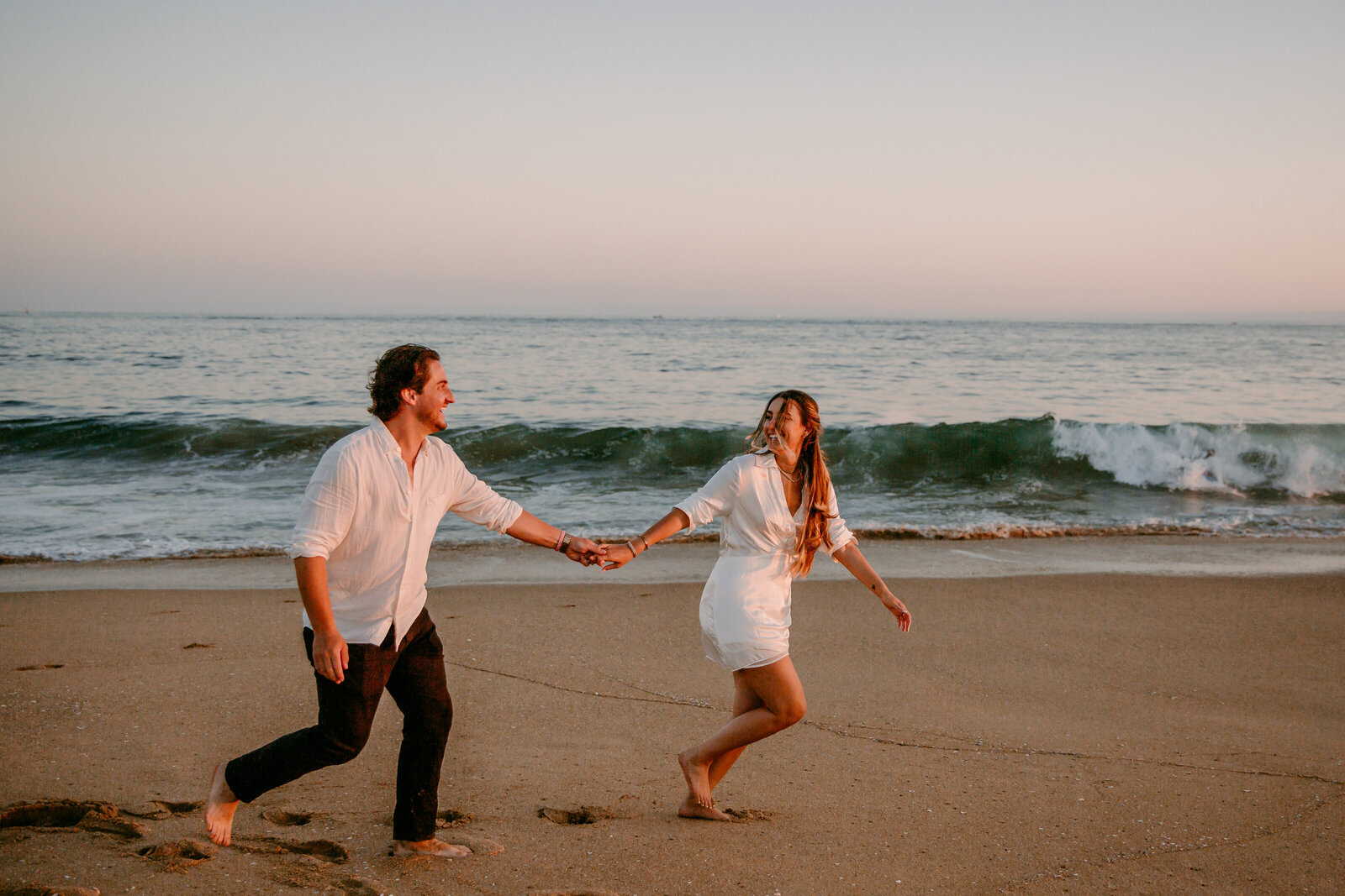 southern california beach elopement running on beach