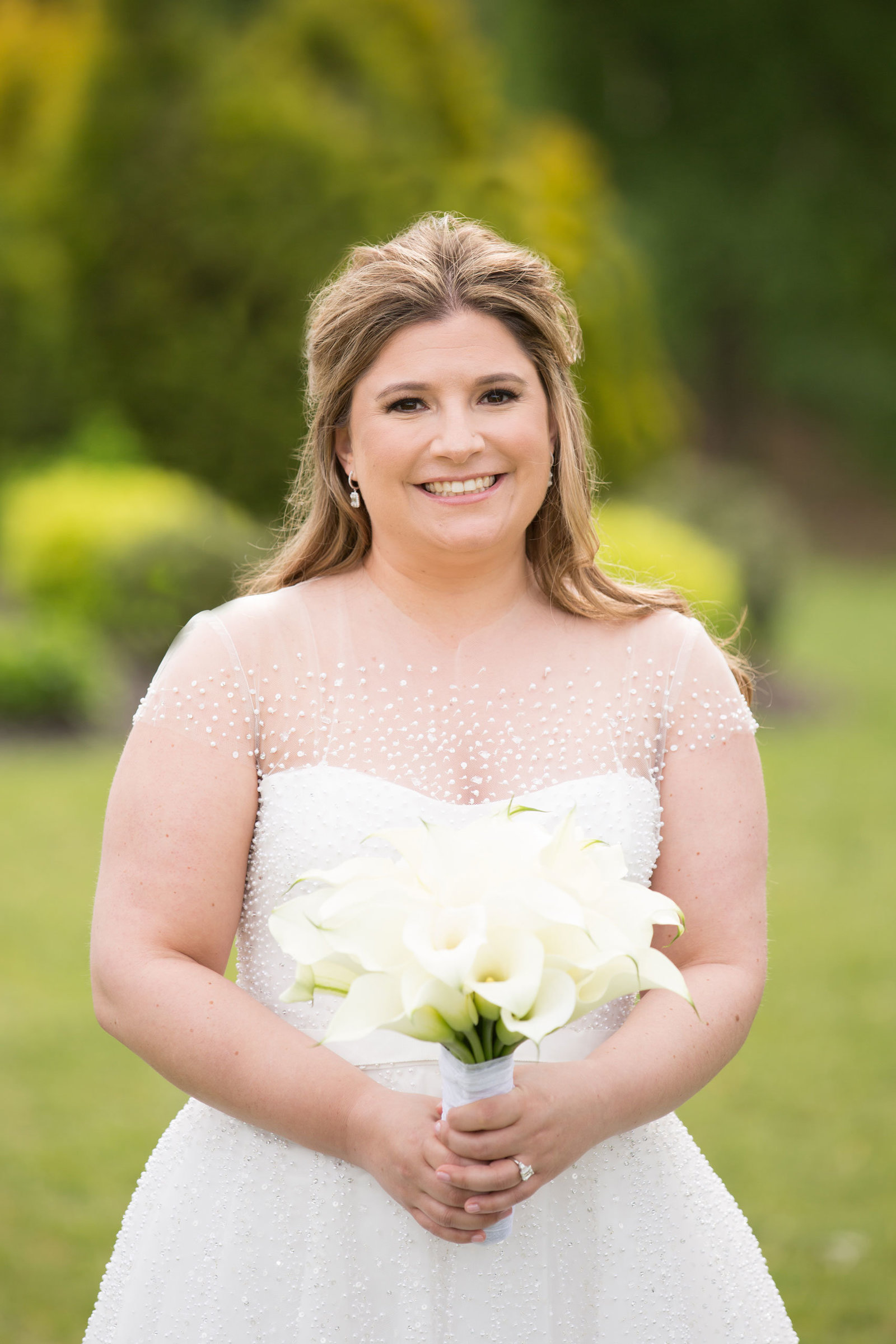 beautiful bride getting ready to walk down the aisle at Engineers Country Club