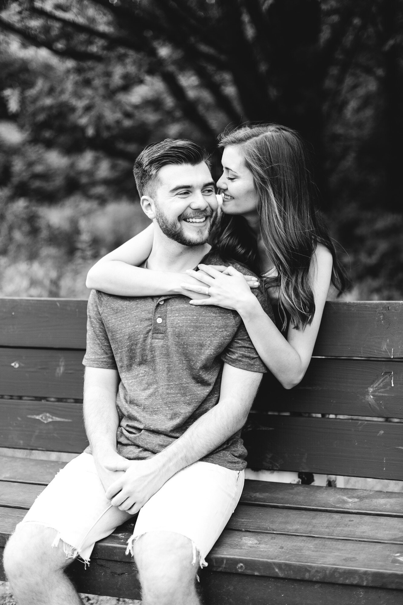 engagement photographer in ohio of bride and groom on bench