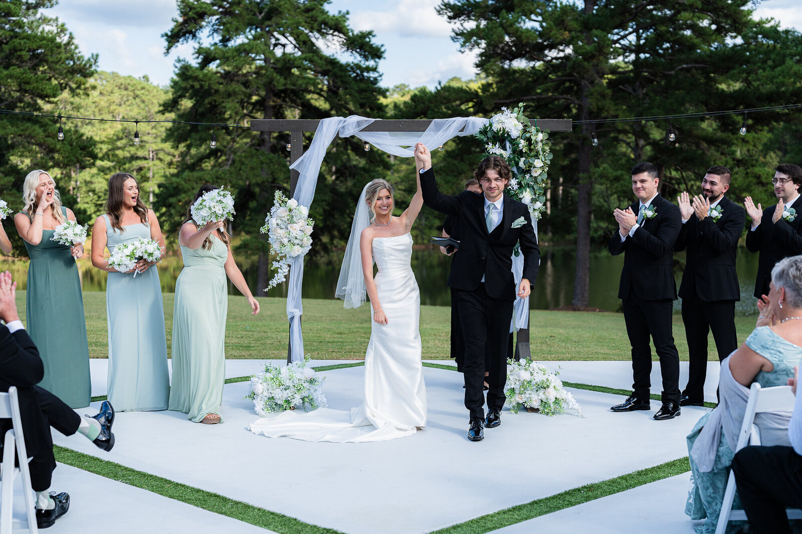 bride and groom celebrating at the end of the ceremony at the Venue Daisy Hill wedding venue 