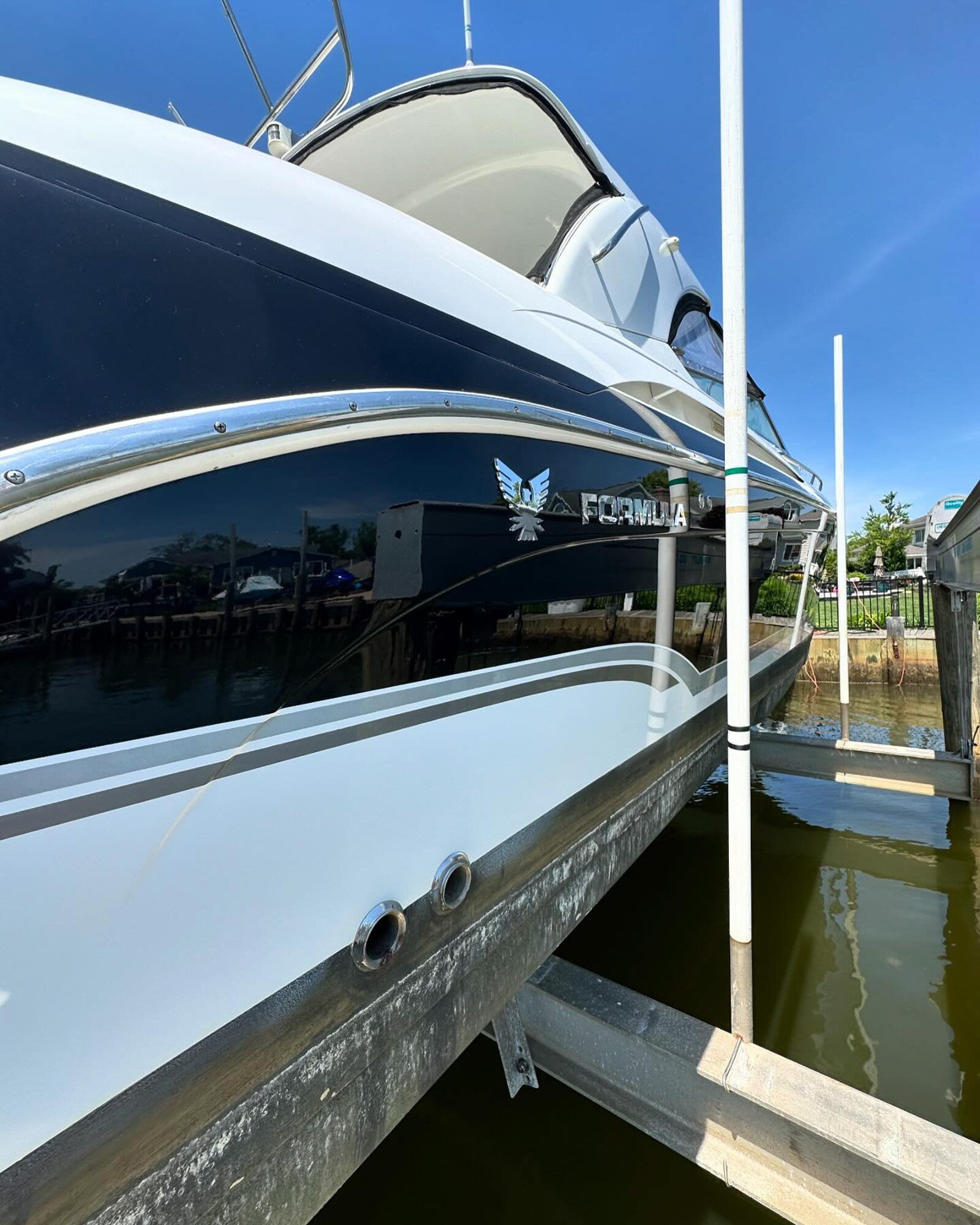 Formula boat on a lift for detailing