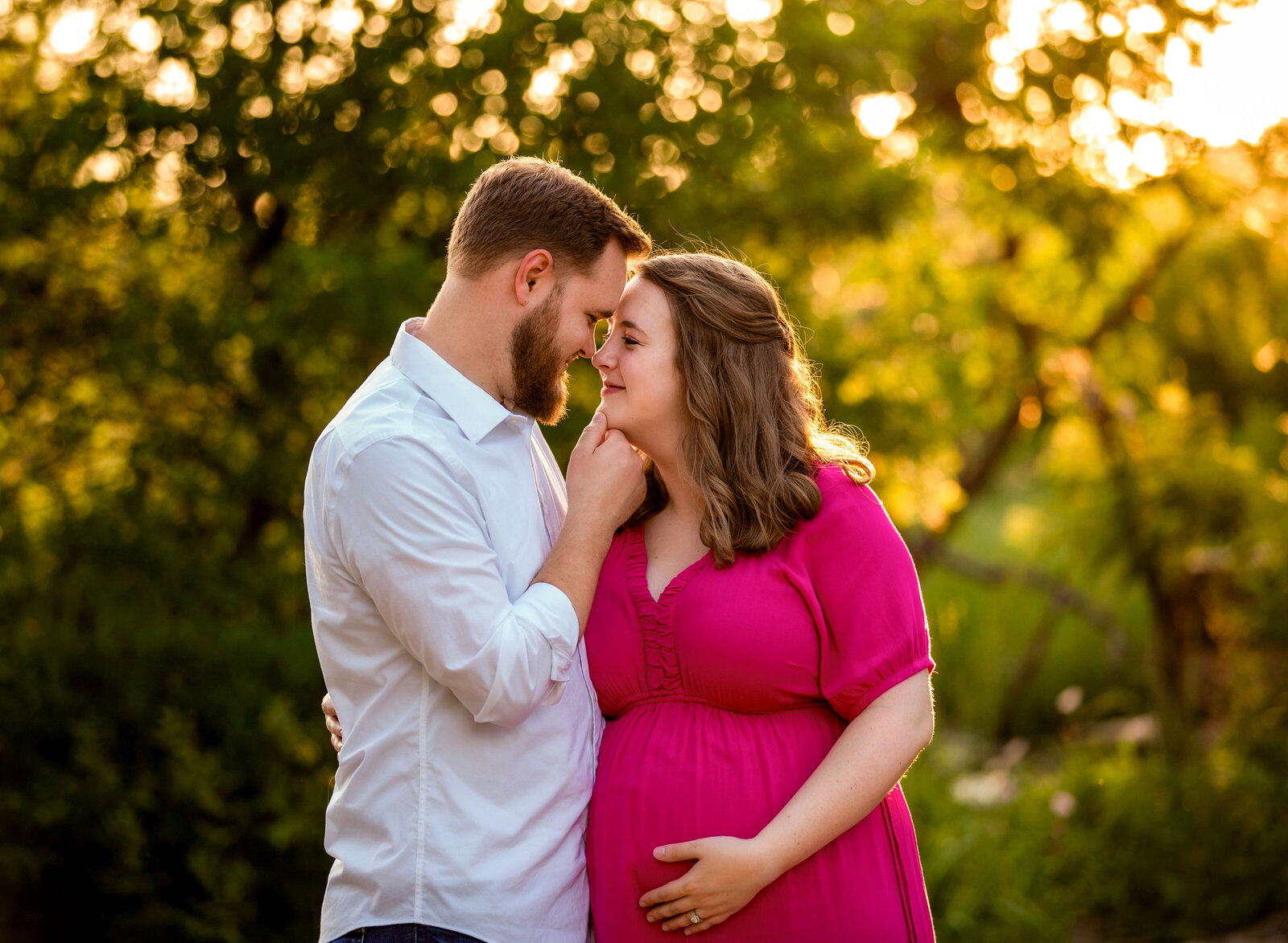 couples maternity in golden light