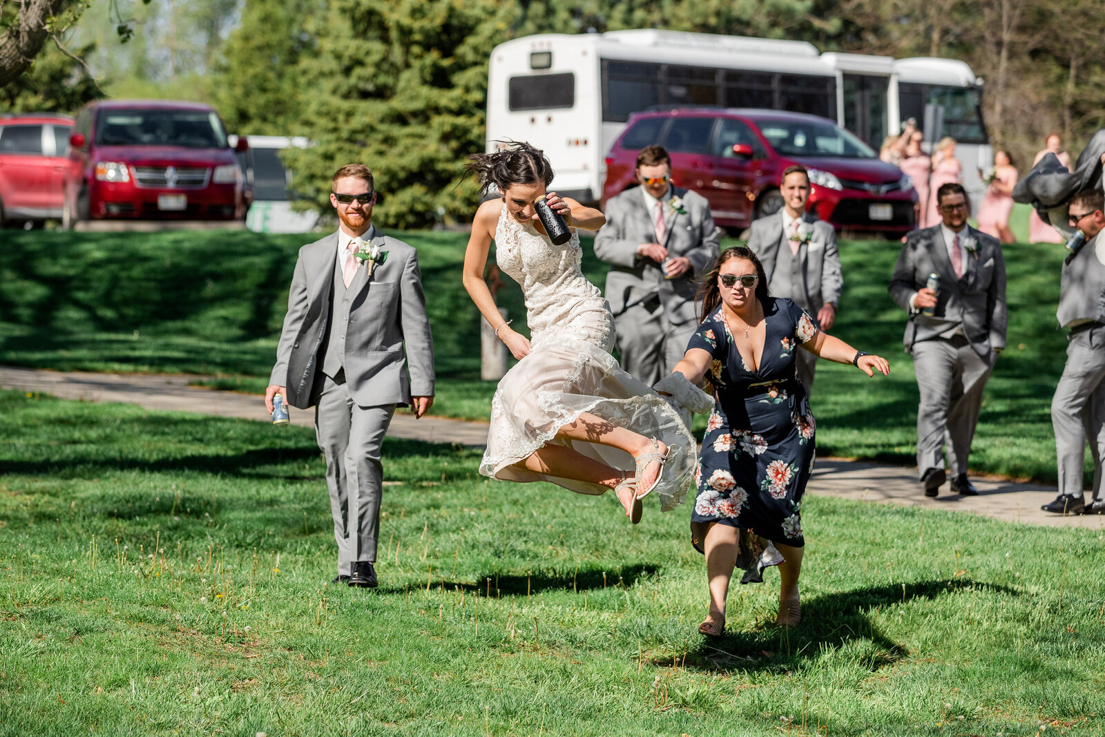 Bride jumping and celebrating