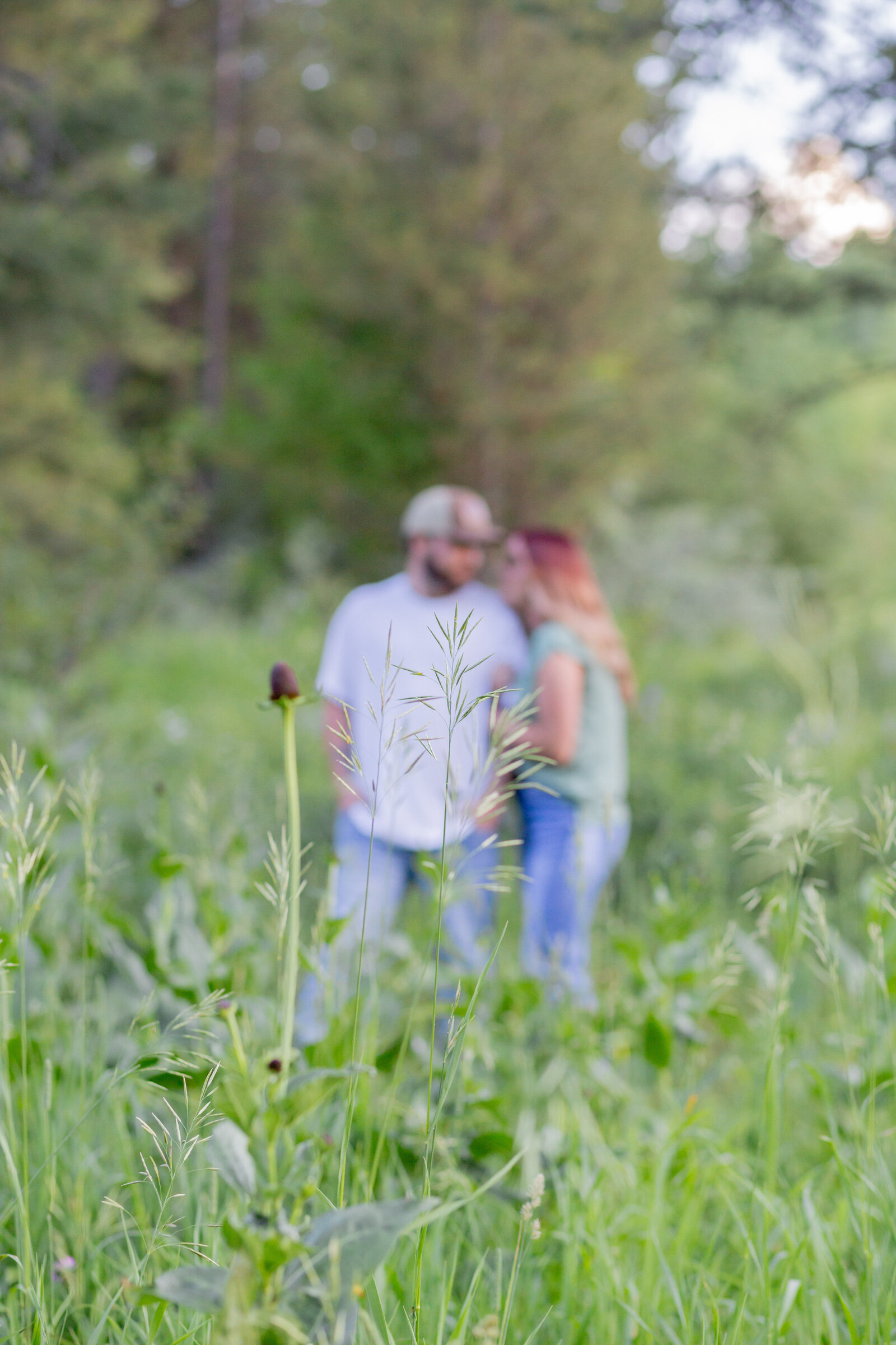 Seattle Wedding Photographer captures couple standing together in a meadow
