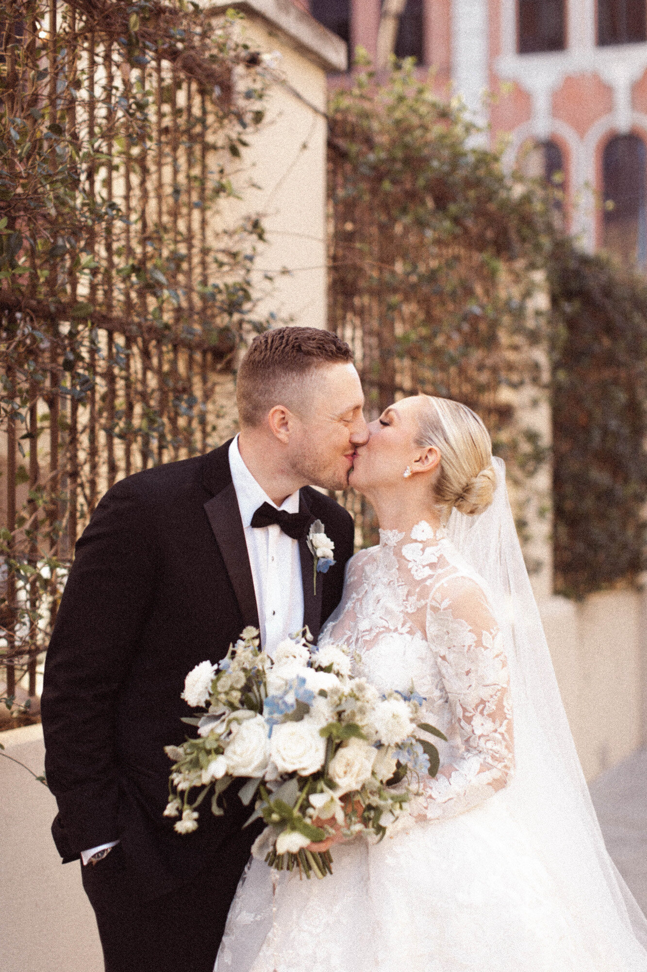 bride and groom kissing