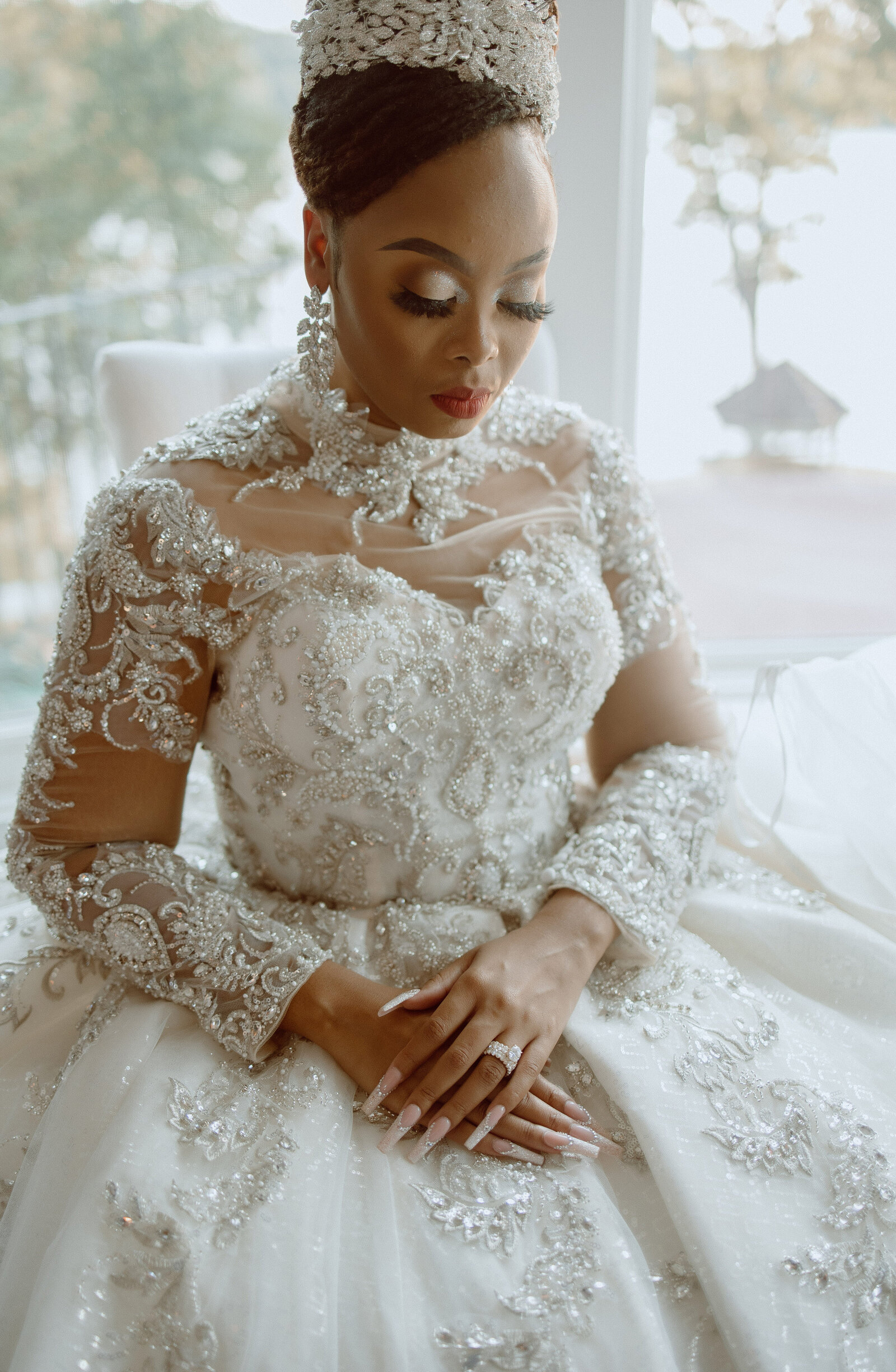 Timeless bridal portrait featuring a lace wedding gown, planned by a luxury wedding coordinator.