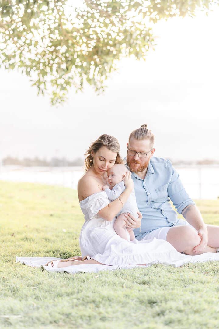 newborn outdoor family session at shorncliffe pier on an overcast day captured by hikari