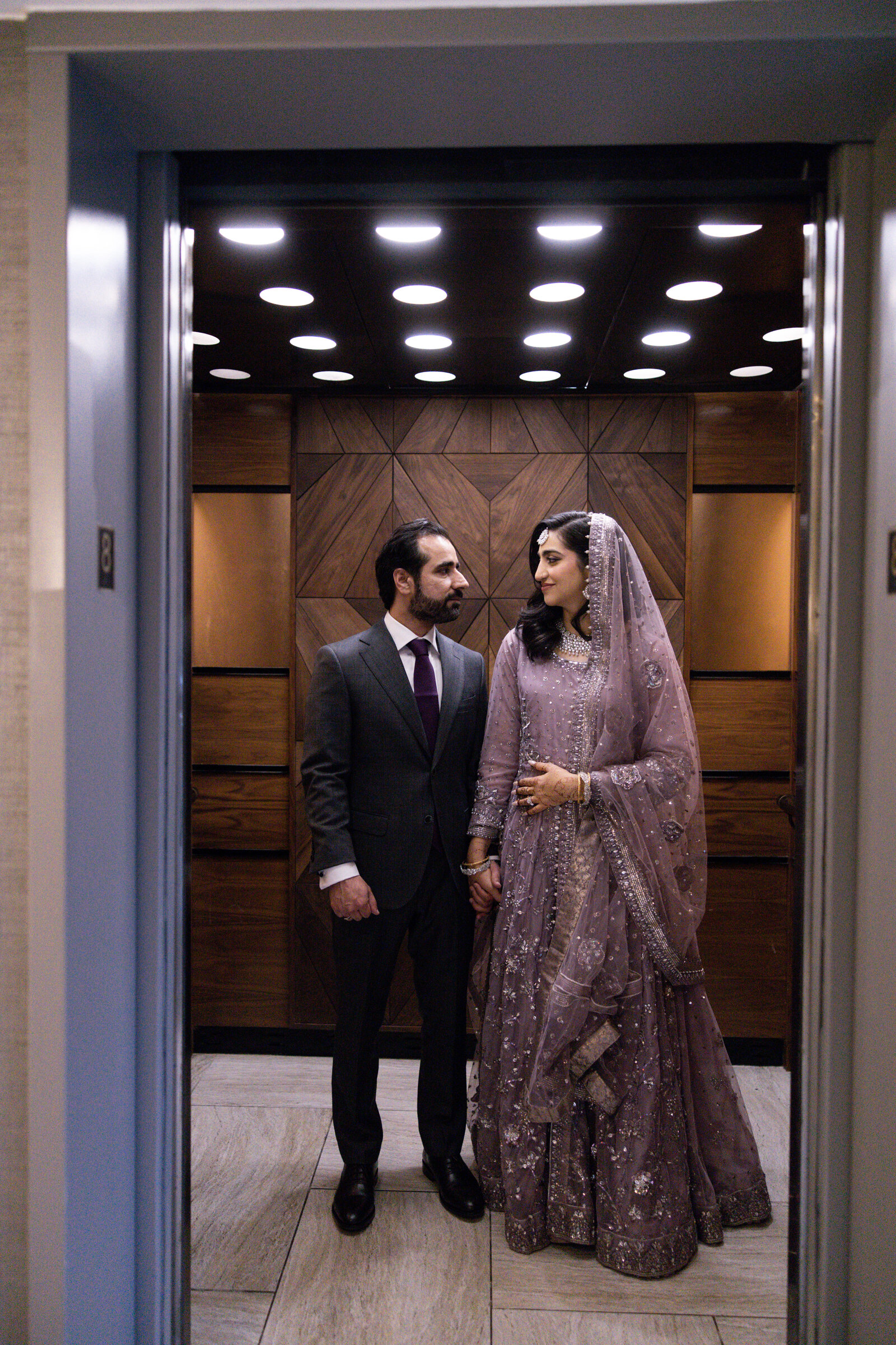 Bride-and-groom-inside-elevator-portrait