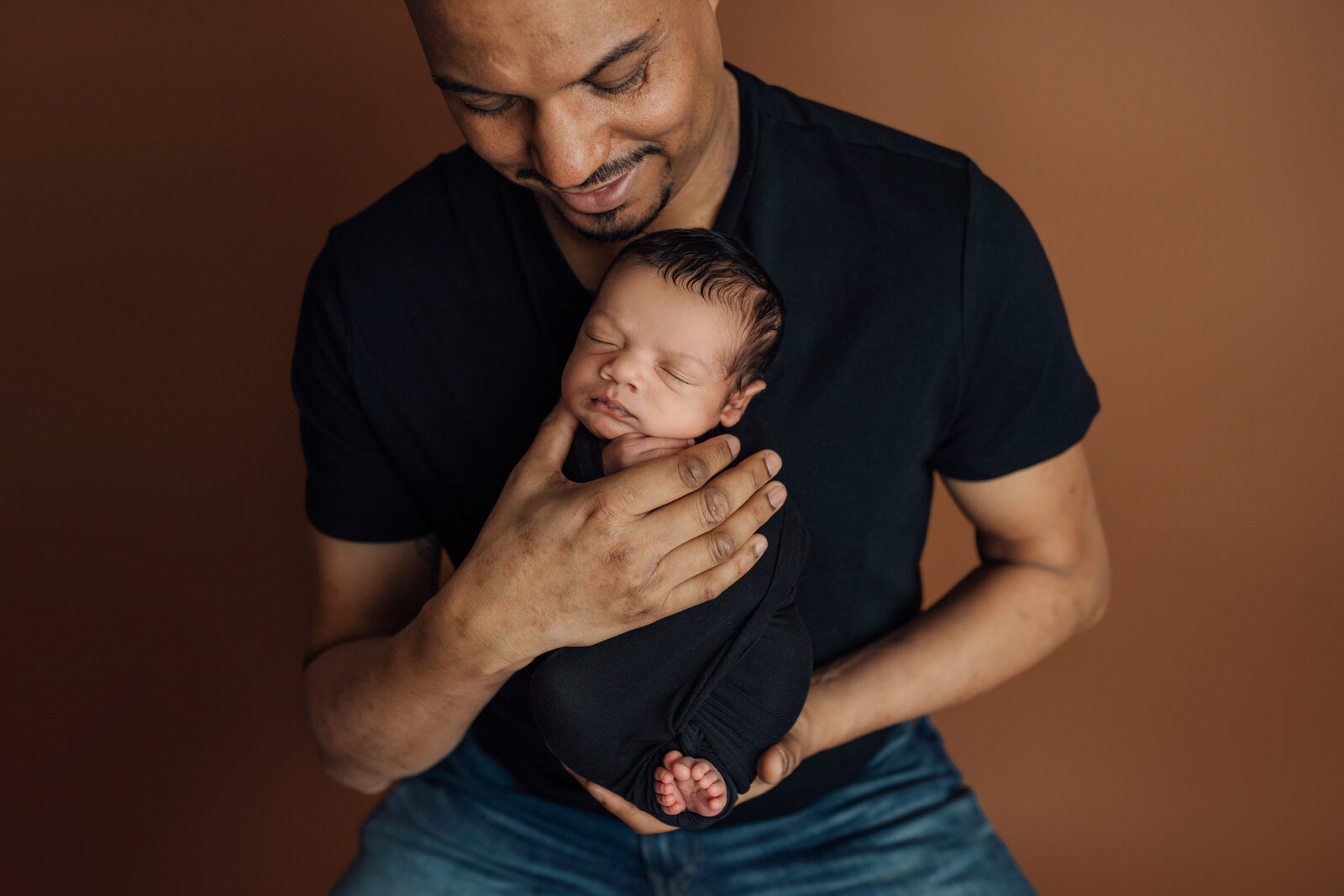 newborn and dad during newborn photography session in Tampa, FL