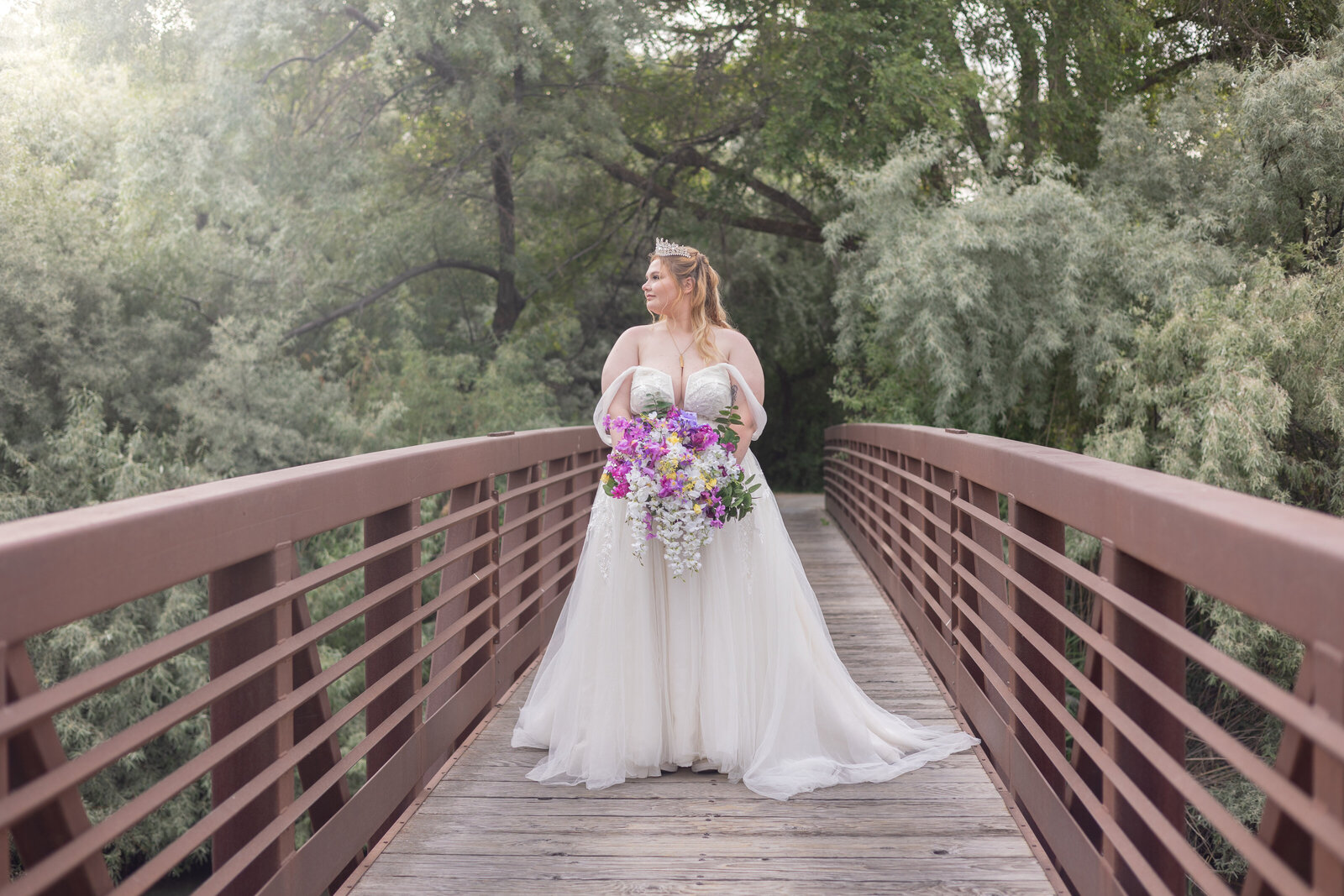 Utah wedding dress with no veil purple bouquet and tiara
