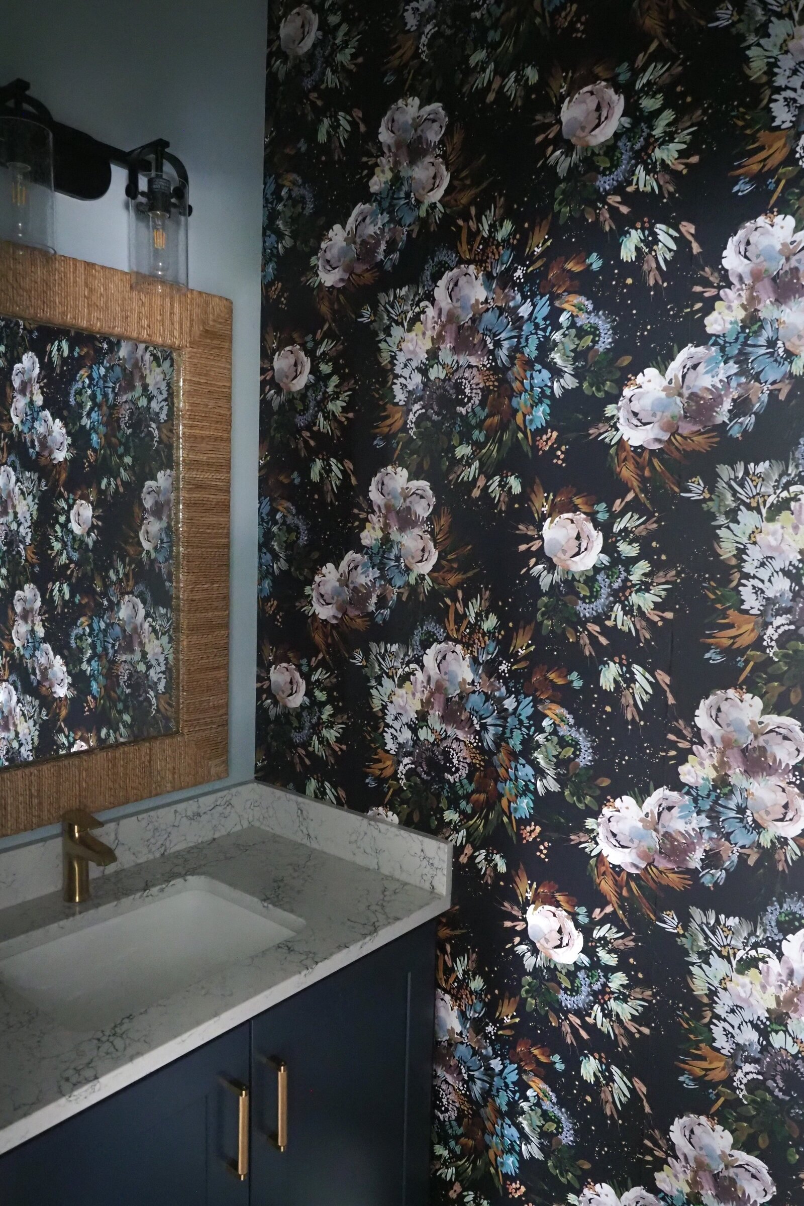 Floral wallpaper in a bathroom.