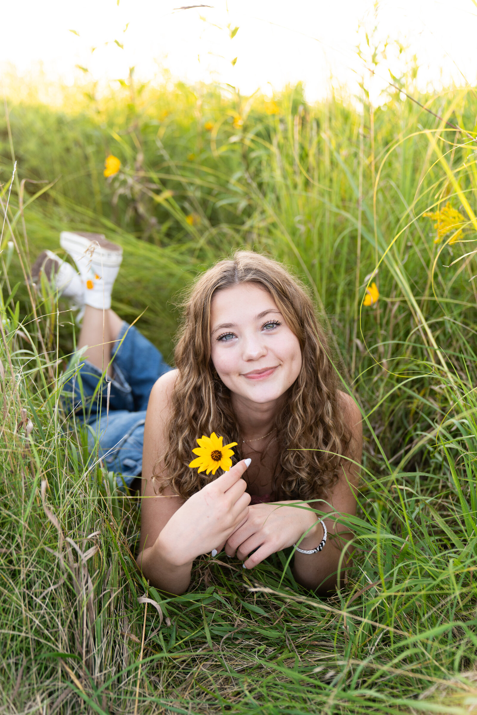 senior pictures in a field