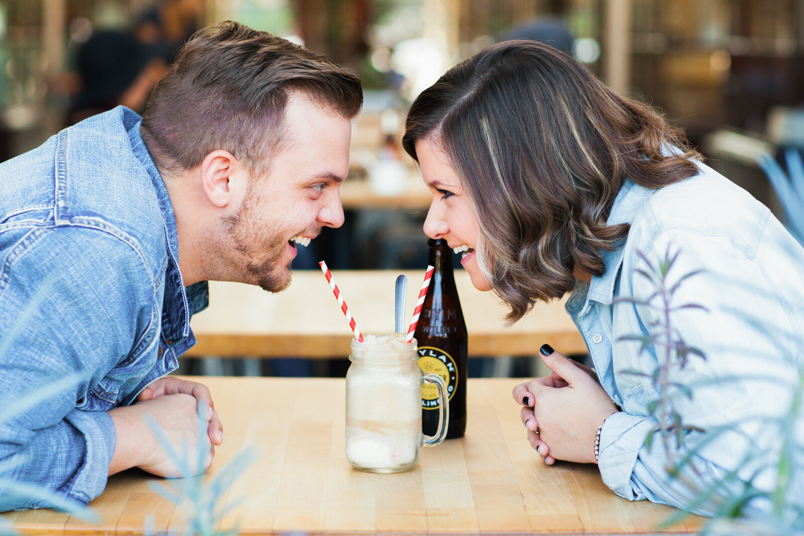 cute couple drinking root beer floats together
