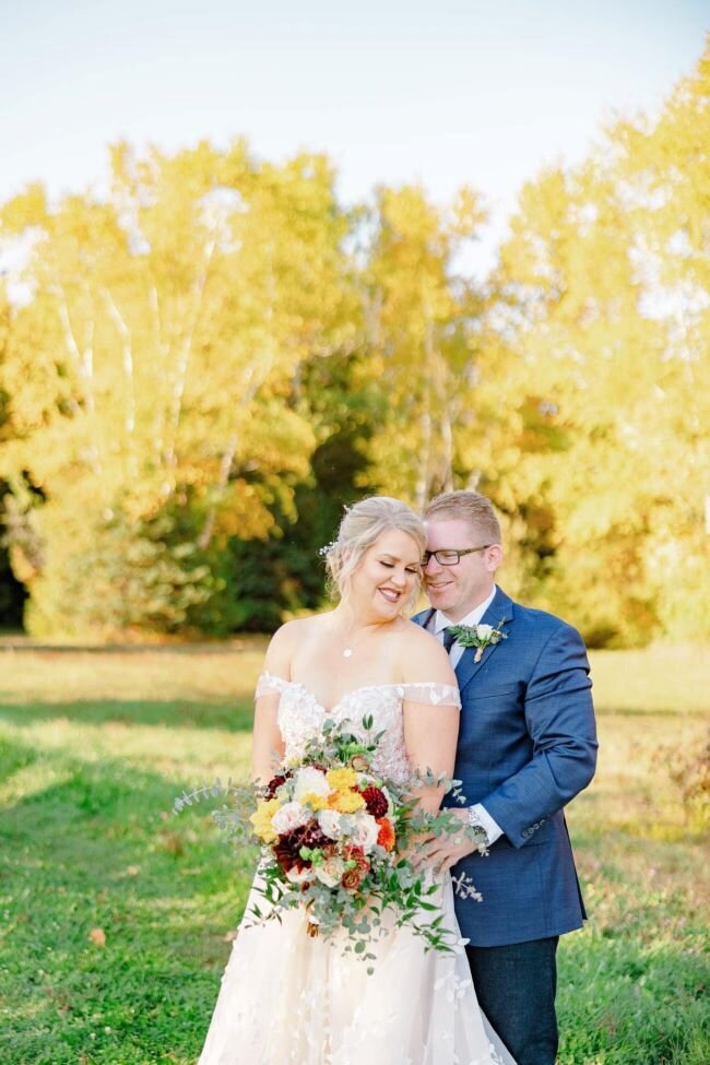 Ottawa wedding couple portrait, bride’s makeup by Red Carpet Glamour, perfectly suiting the joyful occasion.