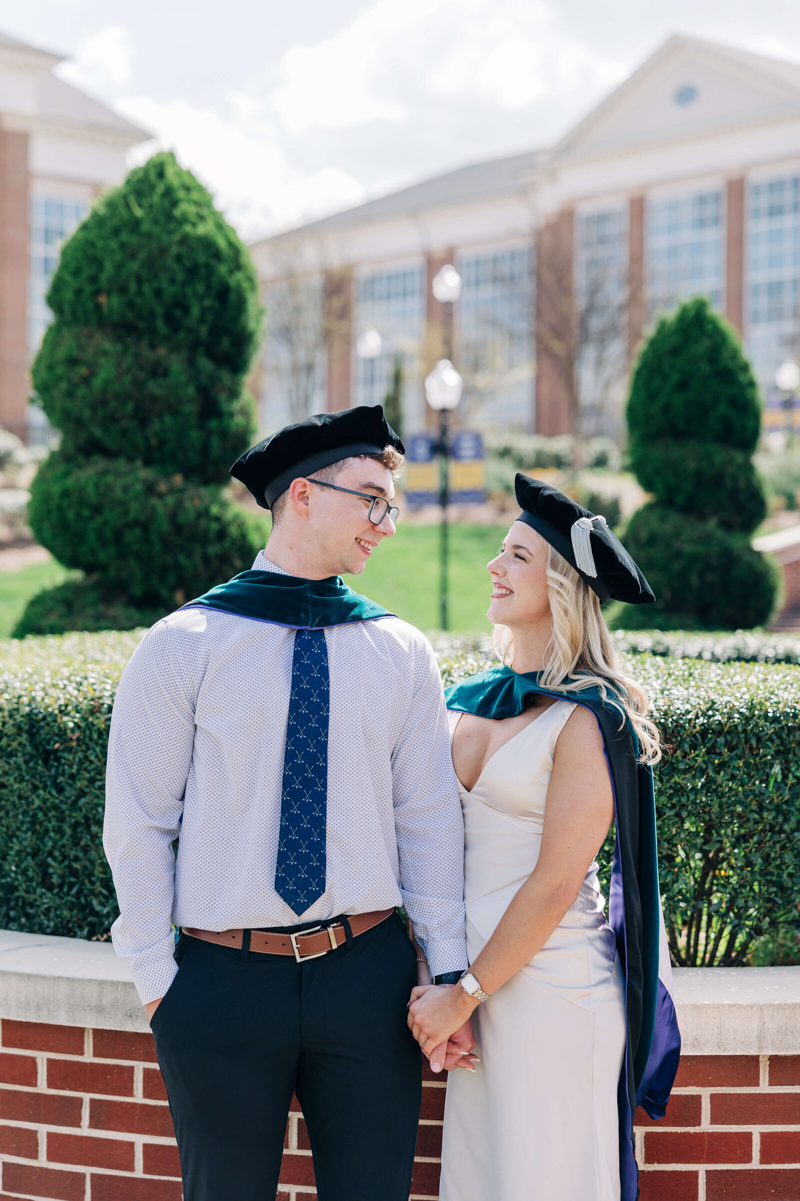 College-grads-looking-at-each-other-High-Point-University