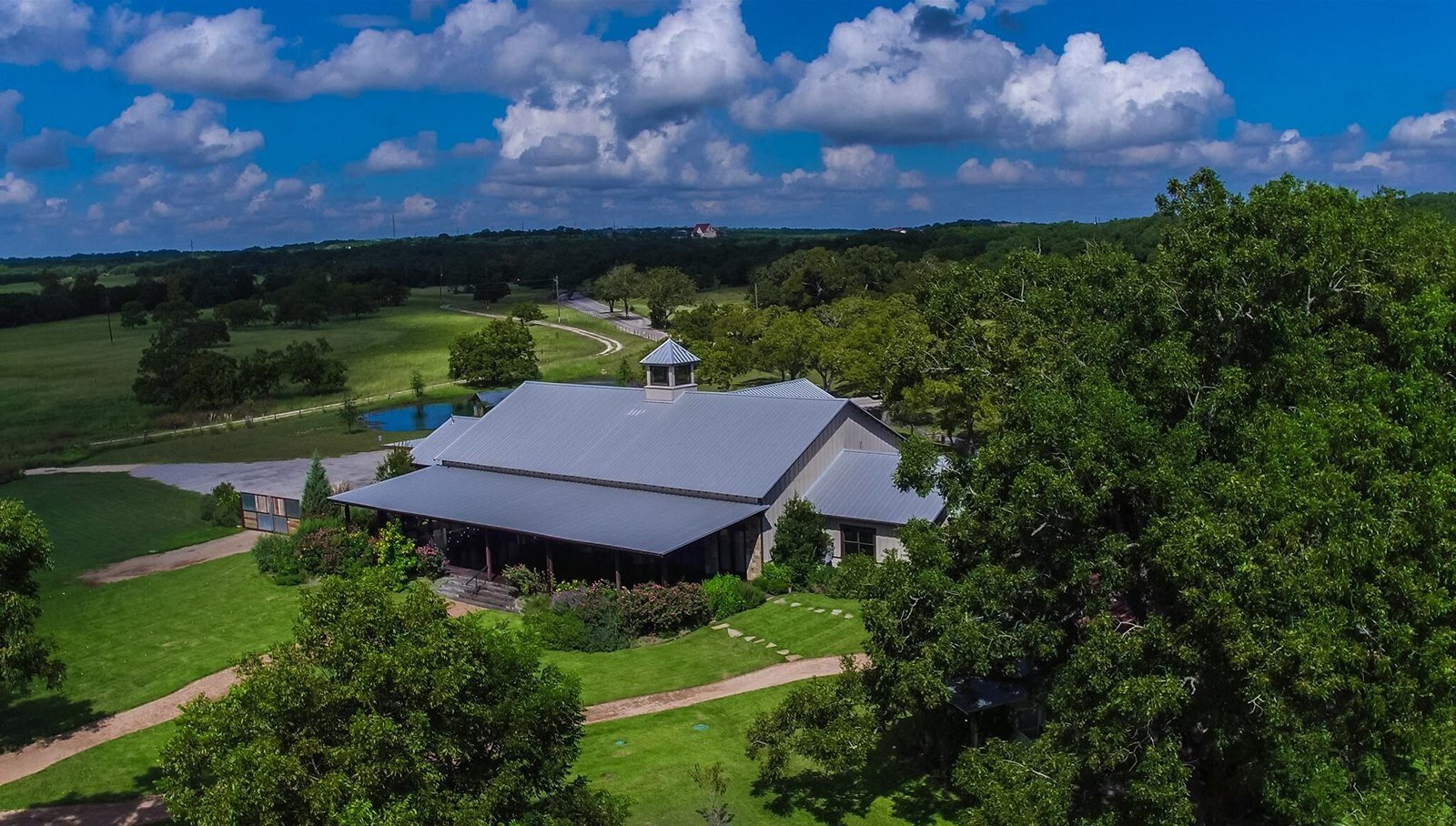 Aerial view of hill country wedding venue Pecan Springs Ranch