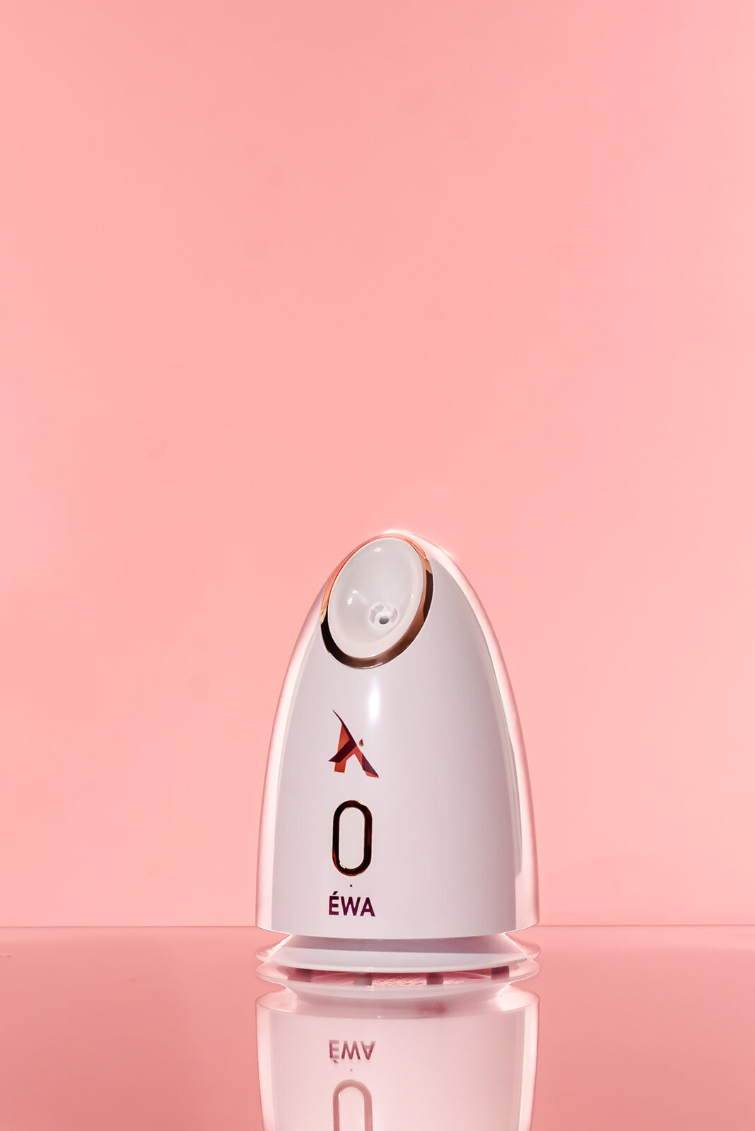 Facial steamer on pink background