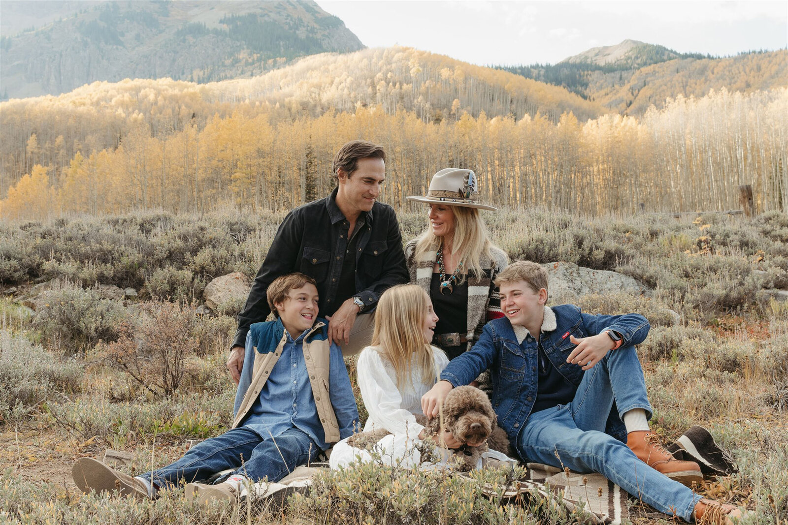 Luxury Aspen family photographer capturing natural connection and candid mountain moments with an editorial touch.