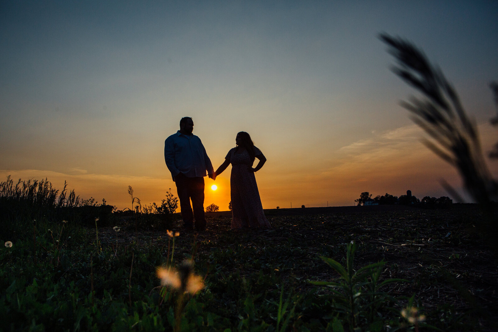 Couple standing with Sunset