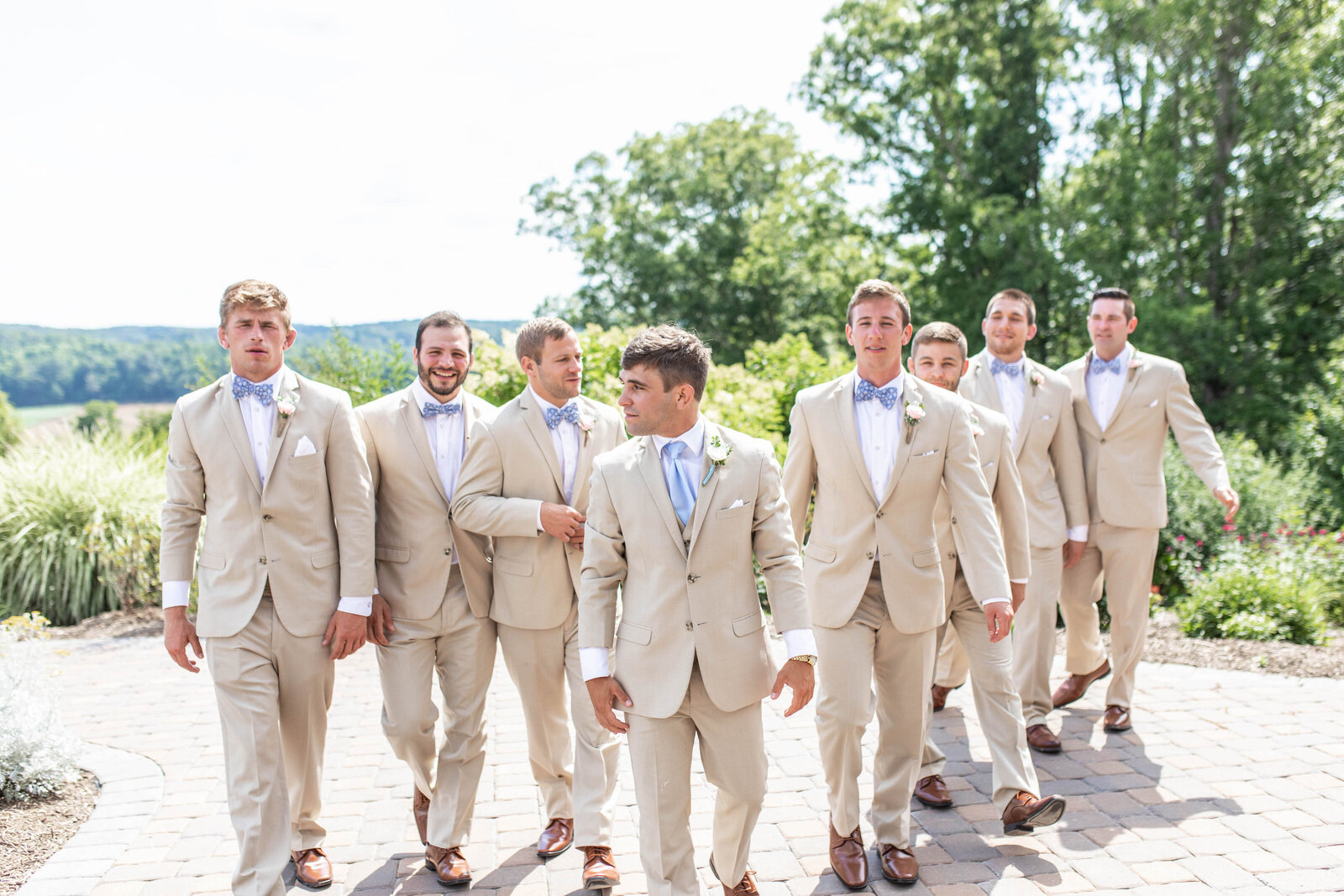 Groom and Groomsmen walk together looking badass