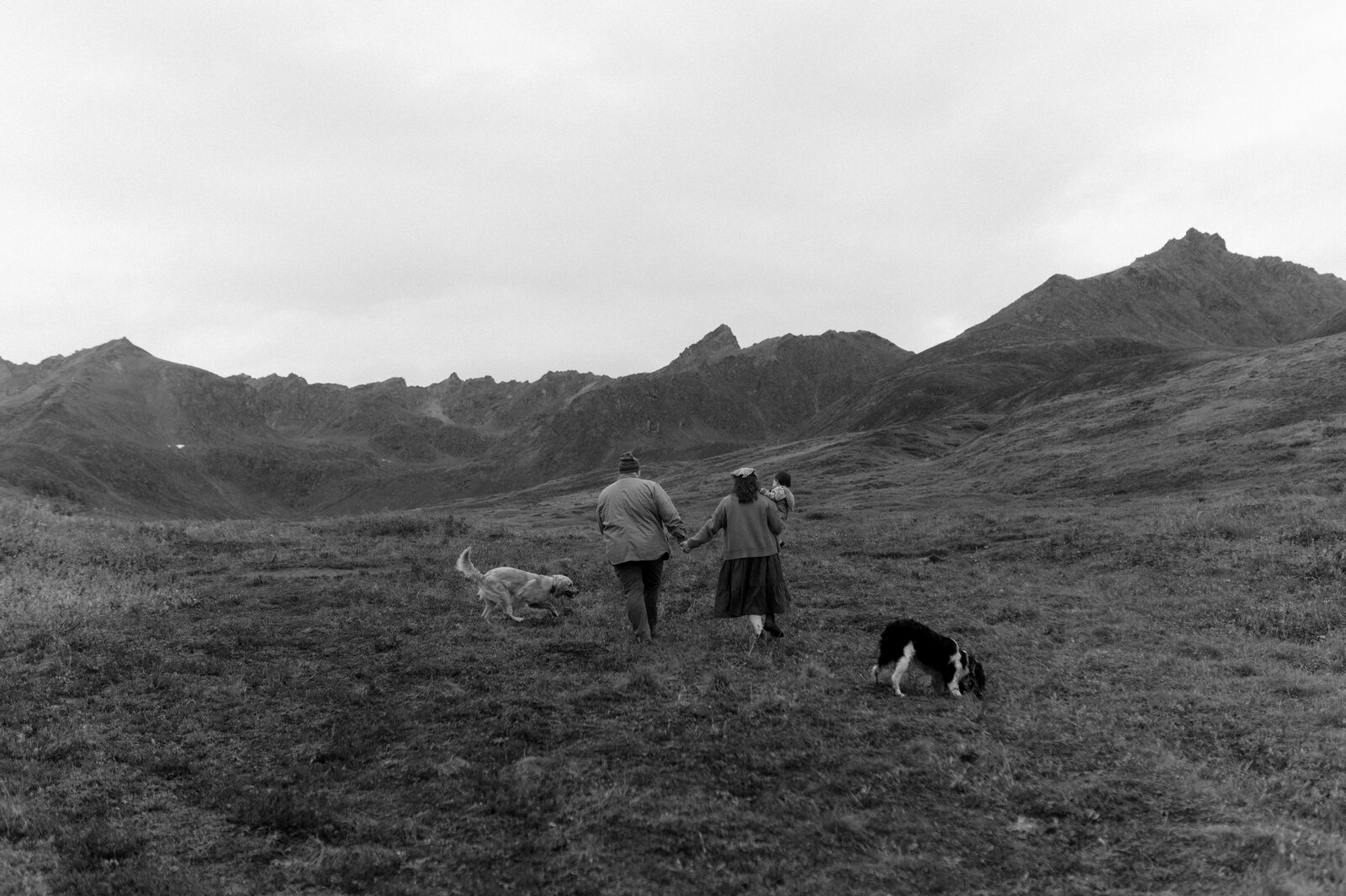 alaska elopement wedding photographer holding film camera