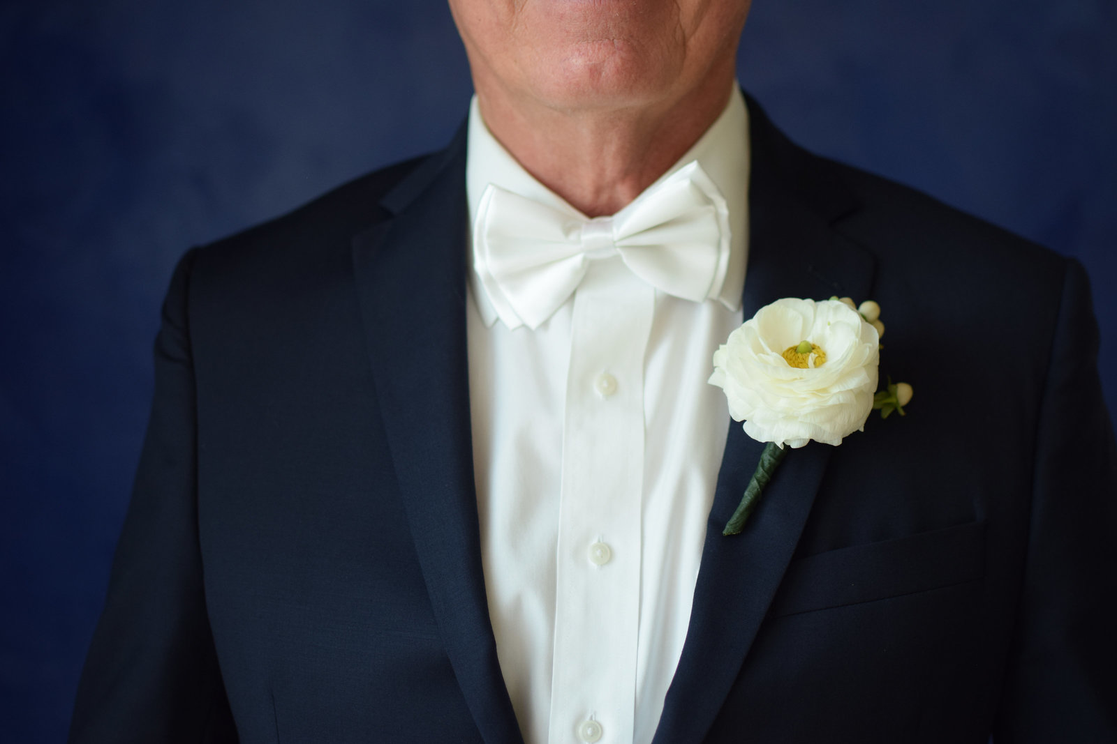 Wedding Groom Portrait Navy Suit White Ranunculus One Ocean Resort Jacksonville Florida