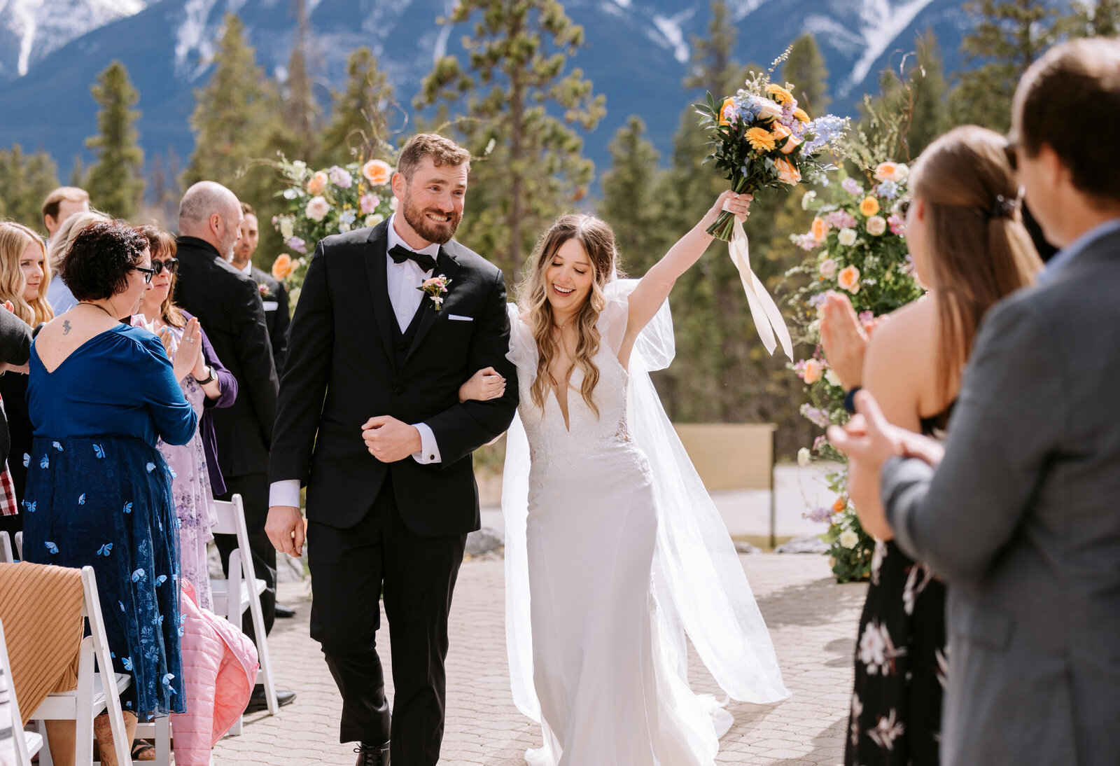 A couple celebrate being married at Silvertip Resort in Canmore, Alberta