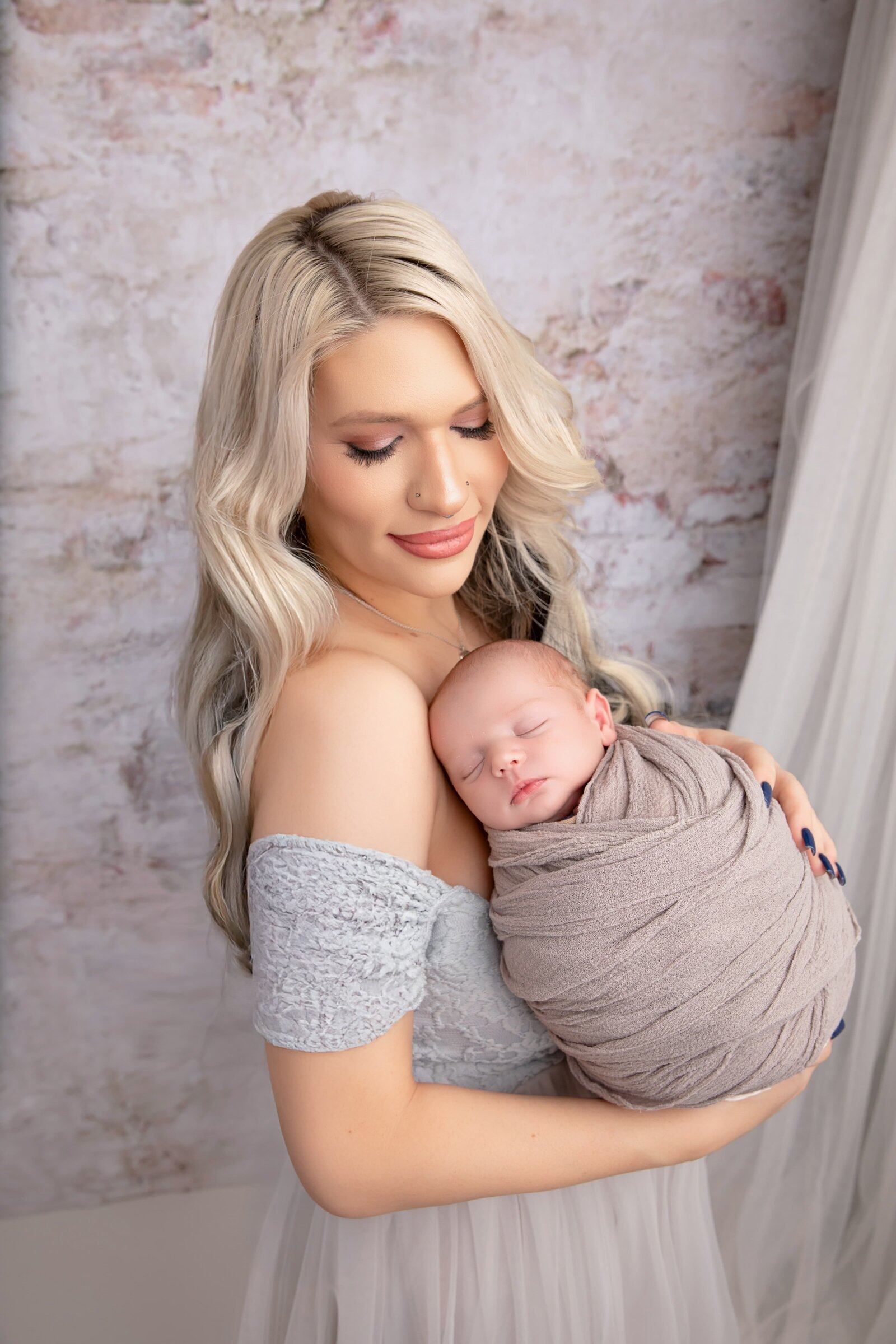 Mom Holding Her Newborn Baby Boy | Phoenix In-Studio Newborn Portraits