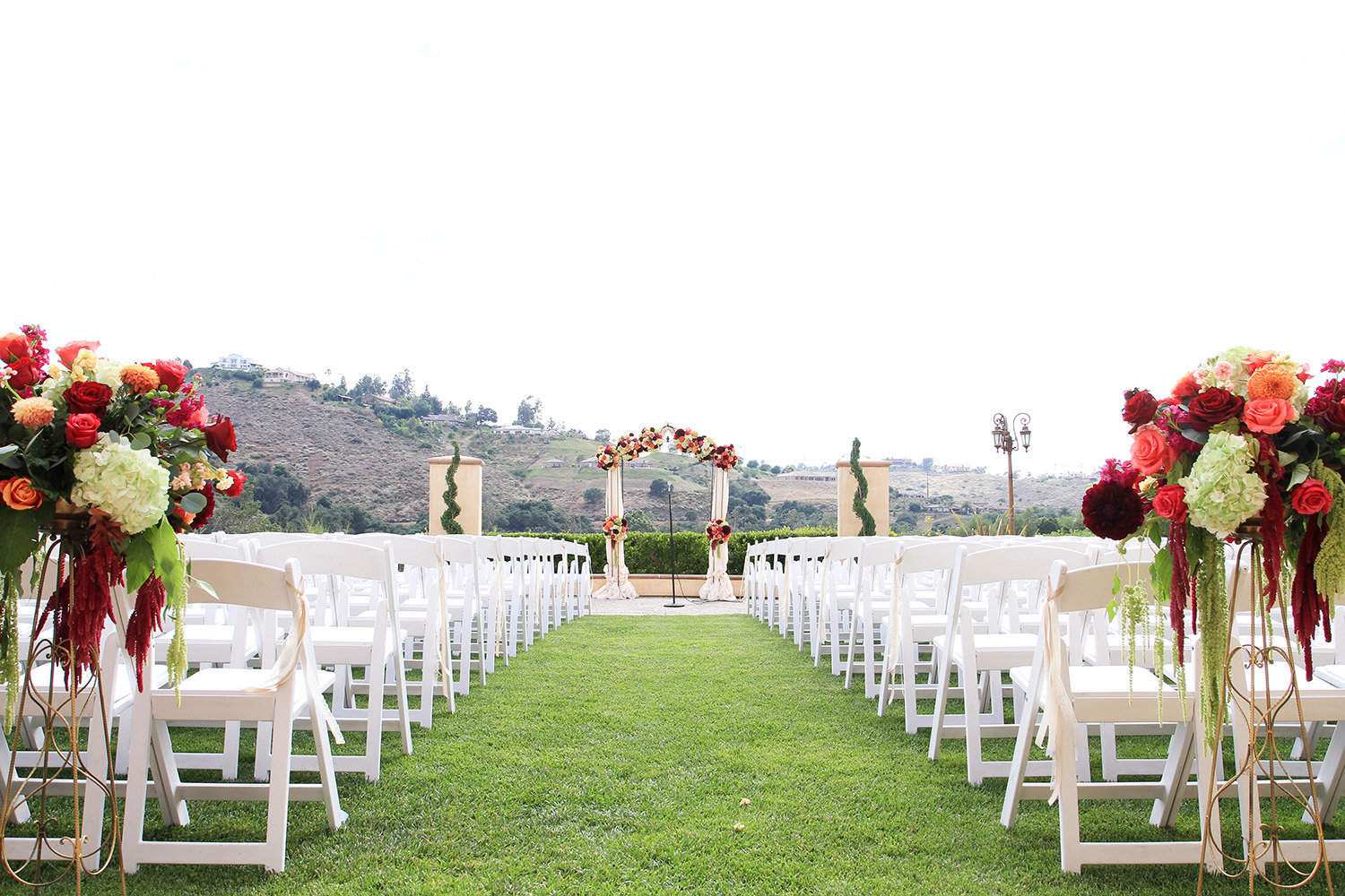 ceremony space with chairs and flowers