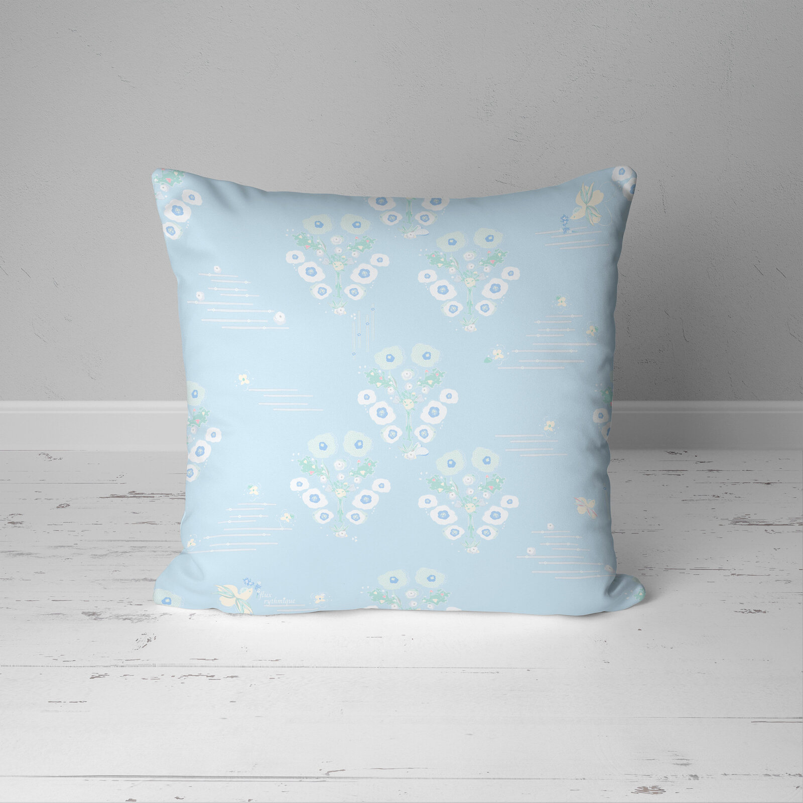 blue and white floral pillow