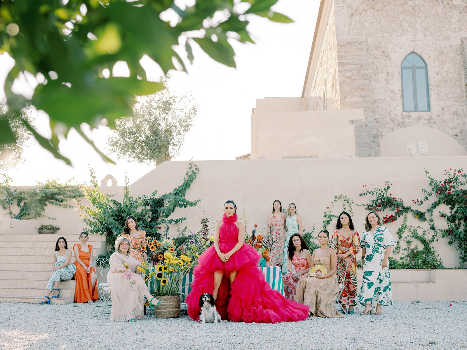 Bride in a fuchsia tulle gown and her bridesmaids by Wedding Planner and Designer by Sofia Nascimento Studios