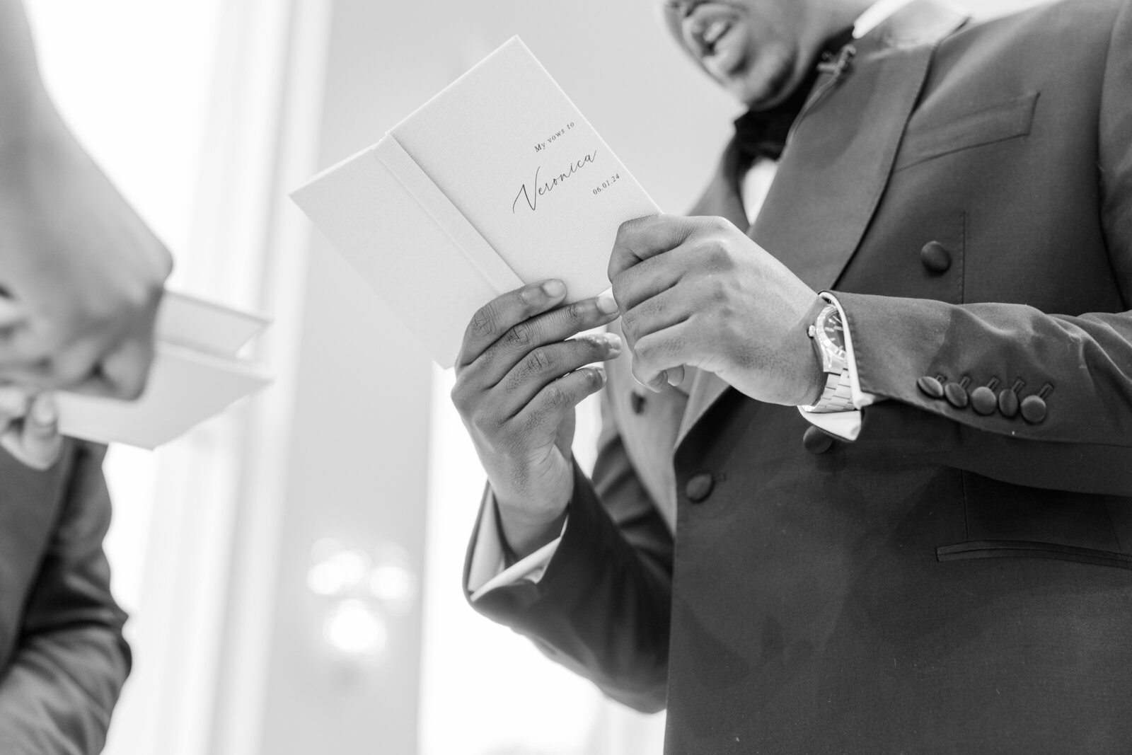 Groom reading vows to the bride at wedding ceremony