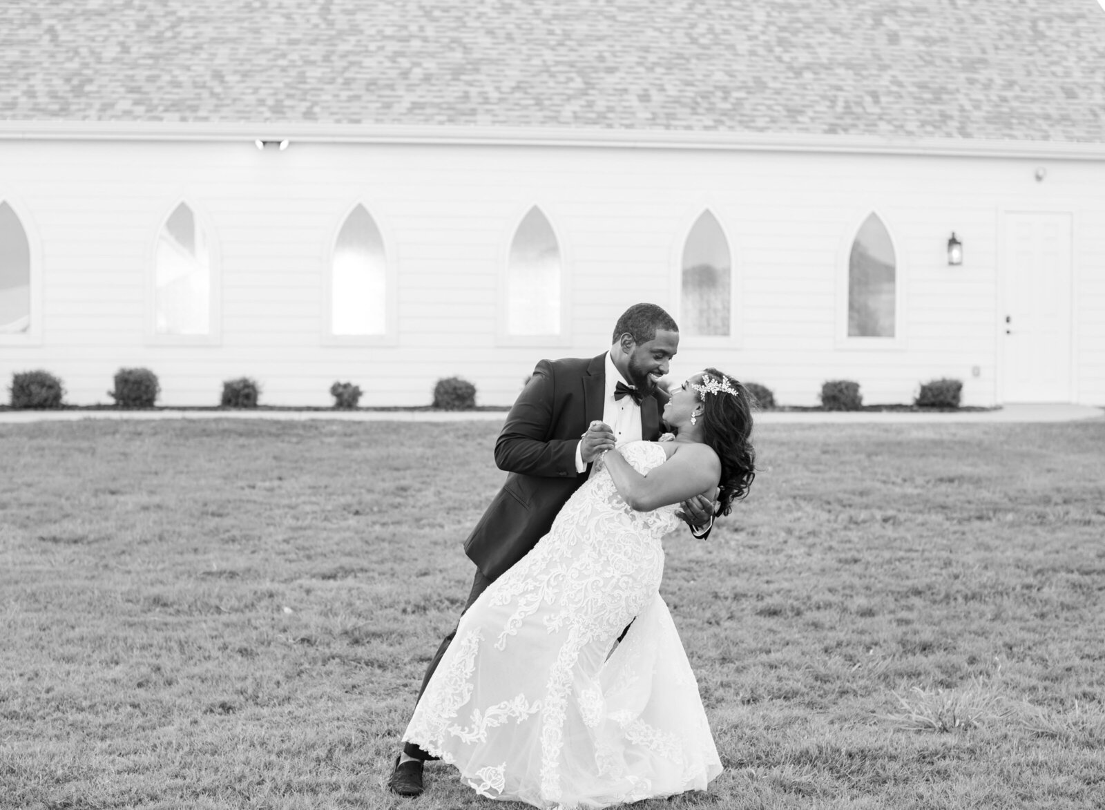 groom dipping bride