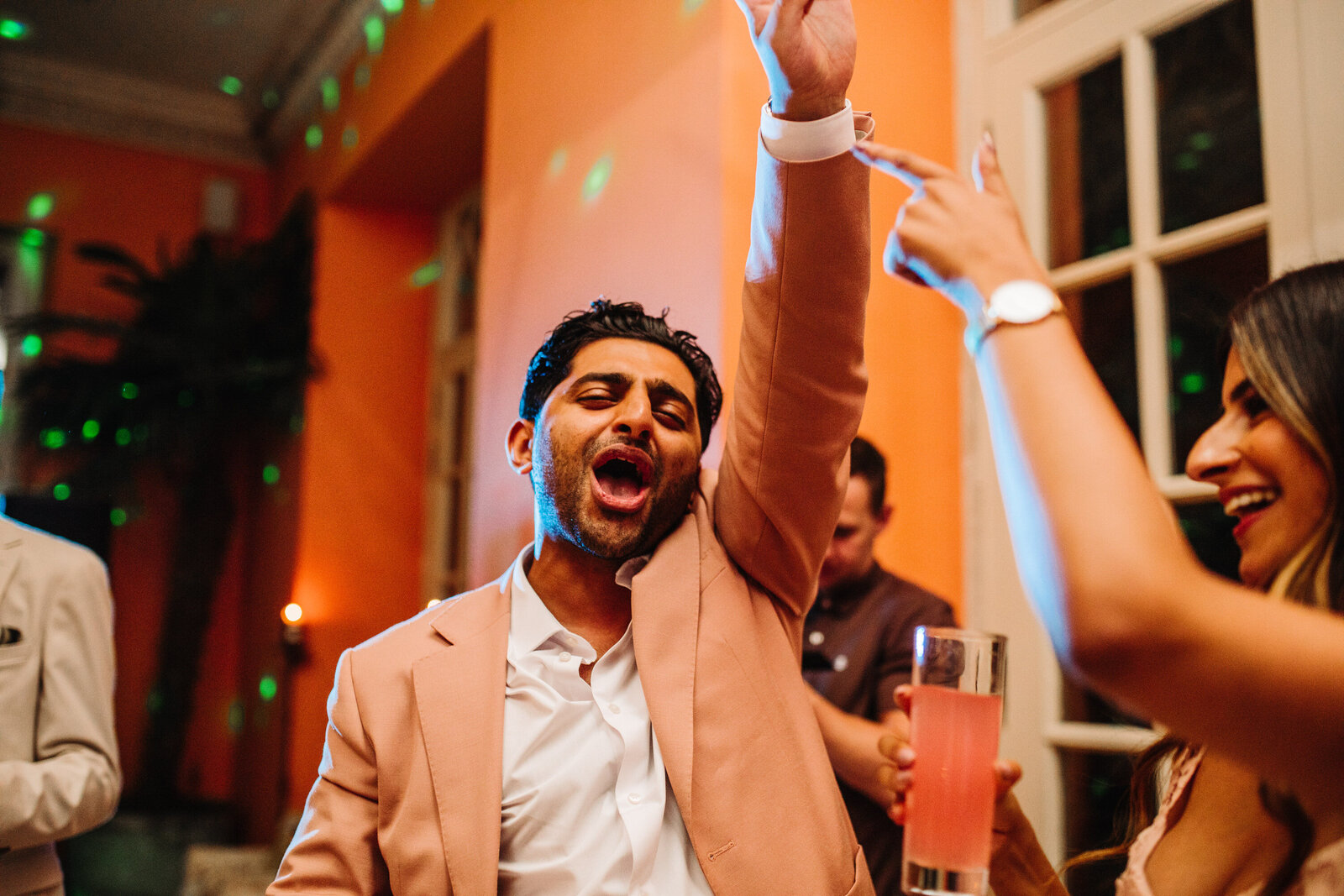 Wedding guest celebrating at reception party