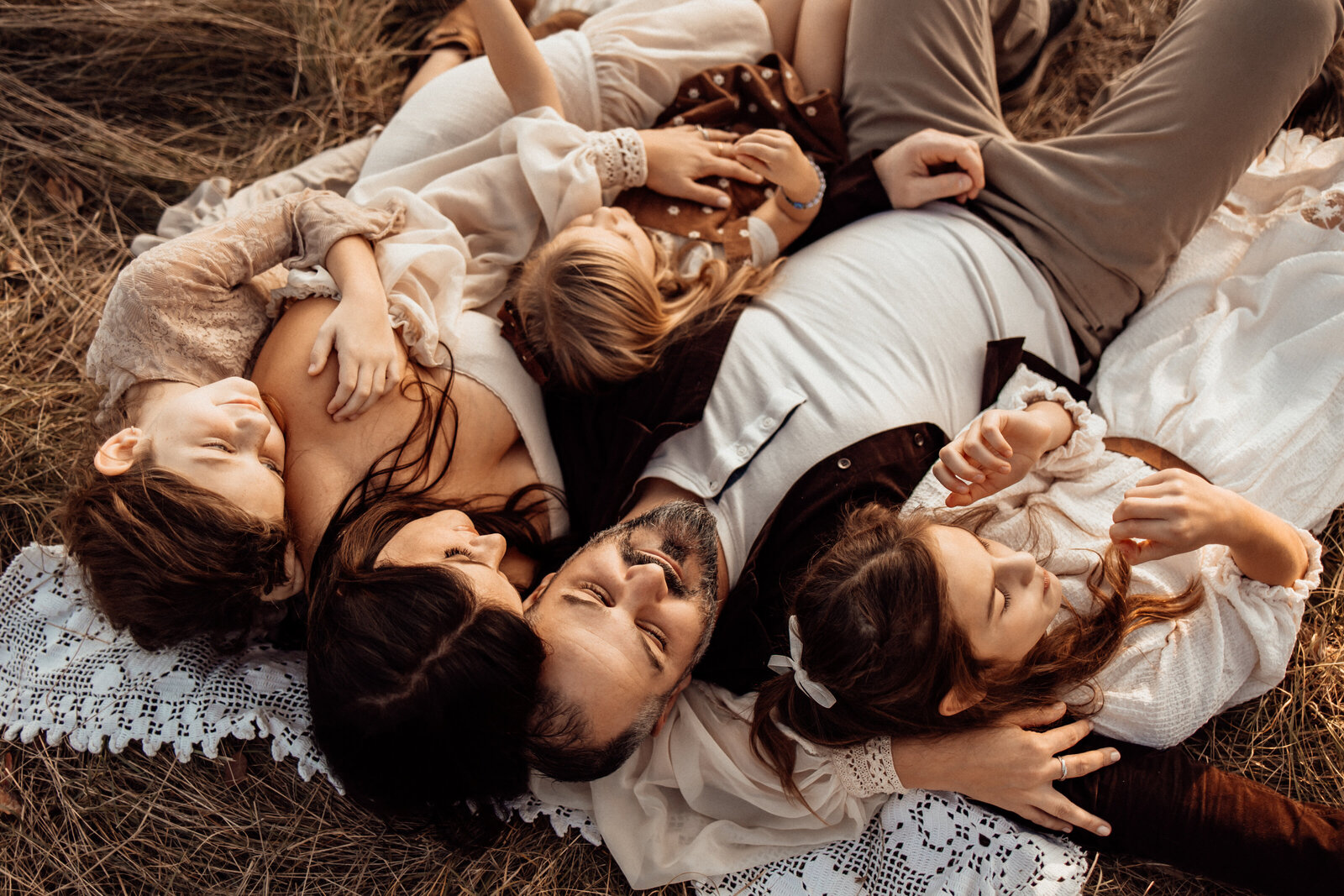 family laying down together for family photos-maternity-photography-lehigh-valley-pennsylvania