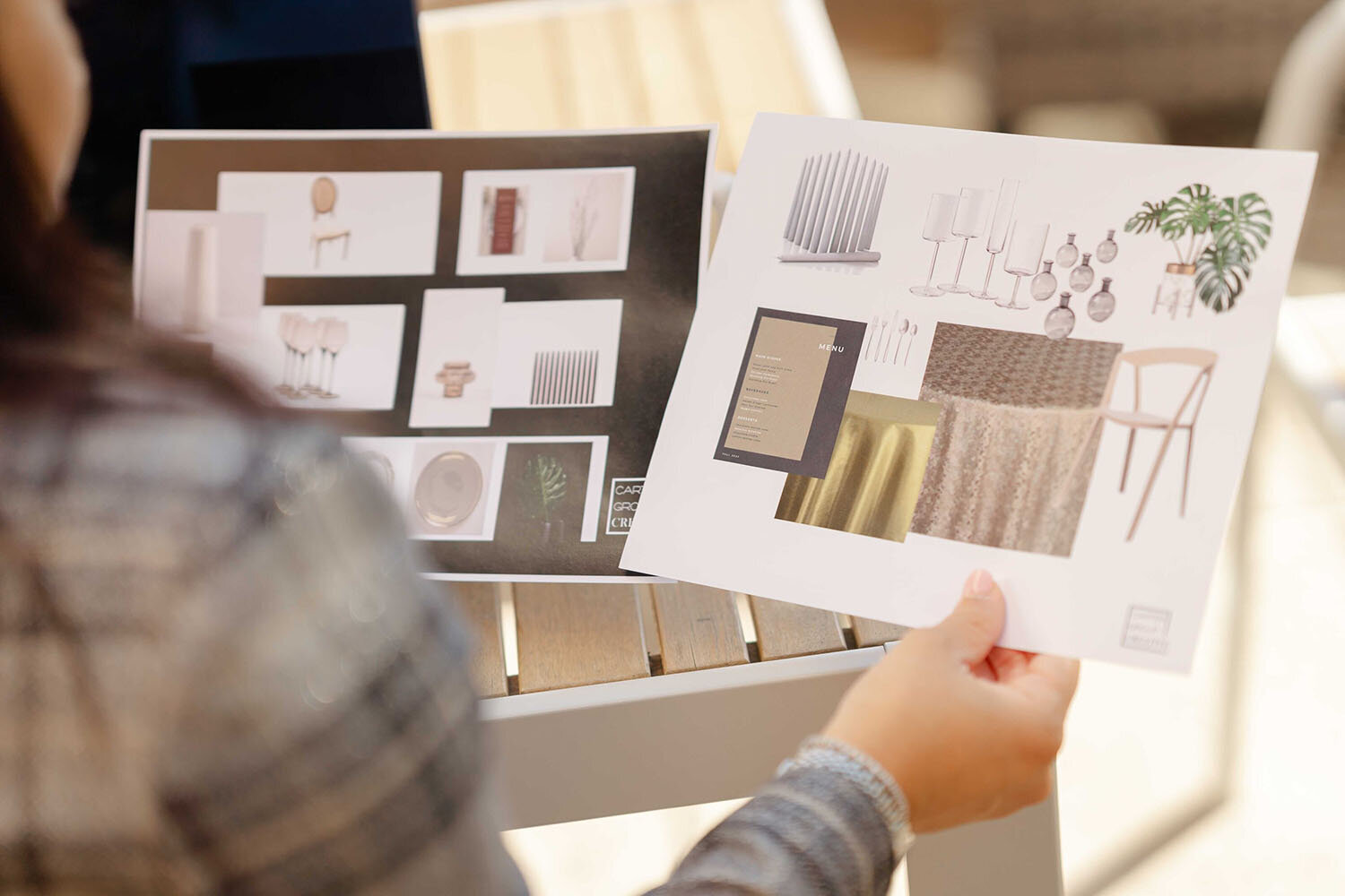 business owner looking at design during Gainesville,VA branding photography