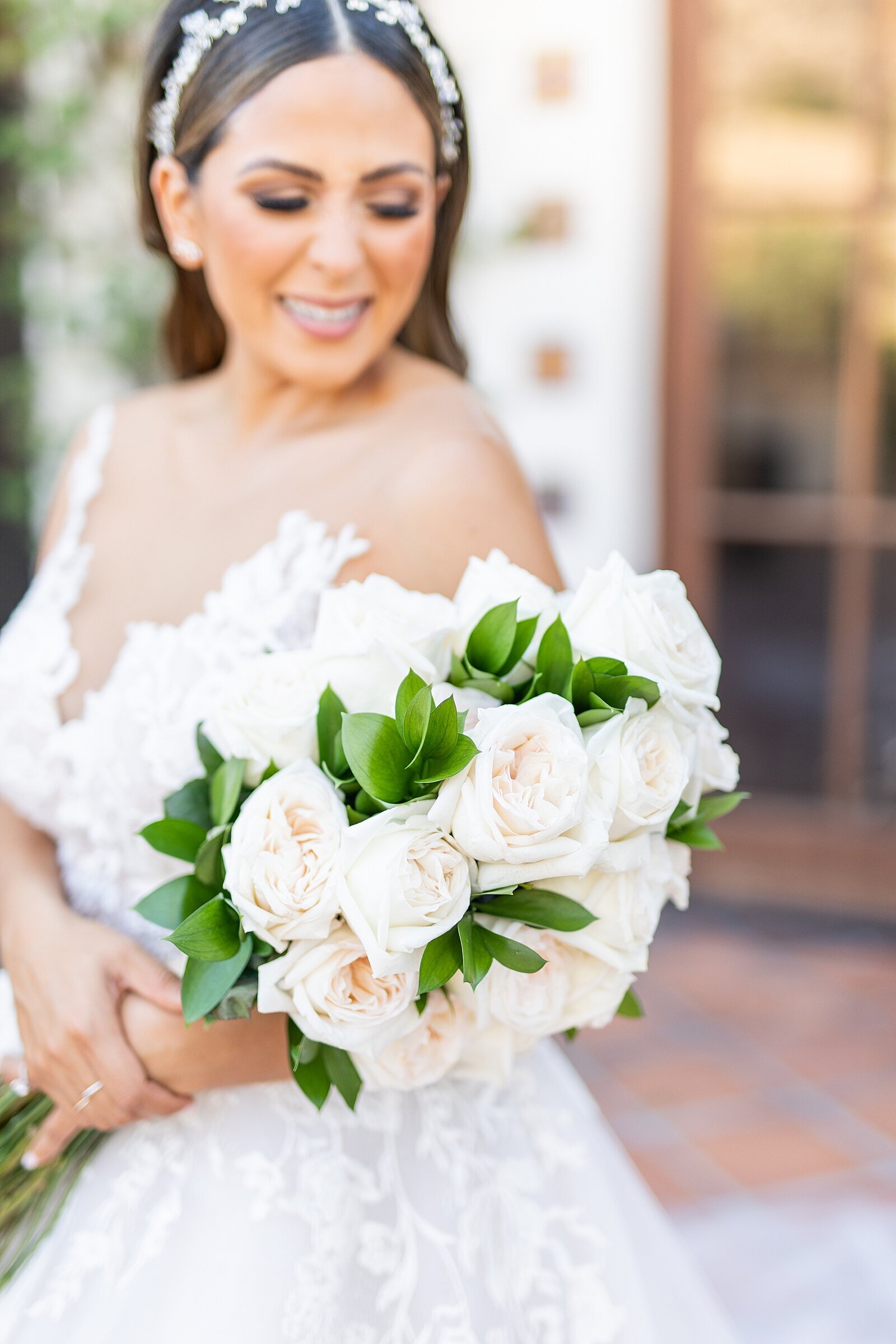 Bride holding bouquet at Hummingbird Nest Wedding Venue in Santa Susana, California. | Sherr Weddings