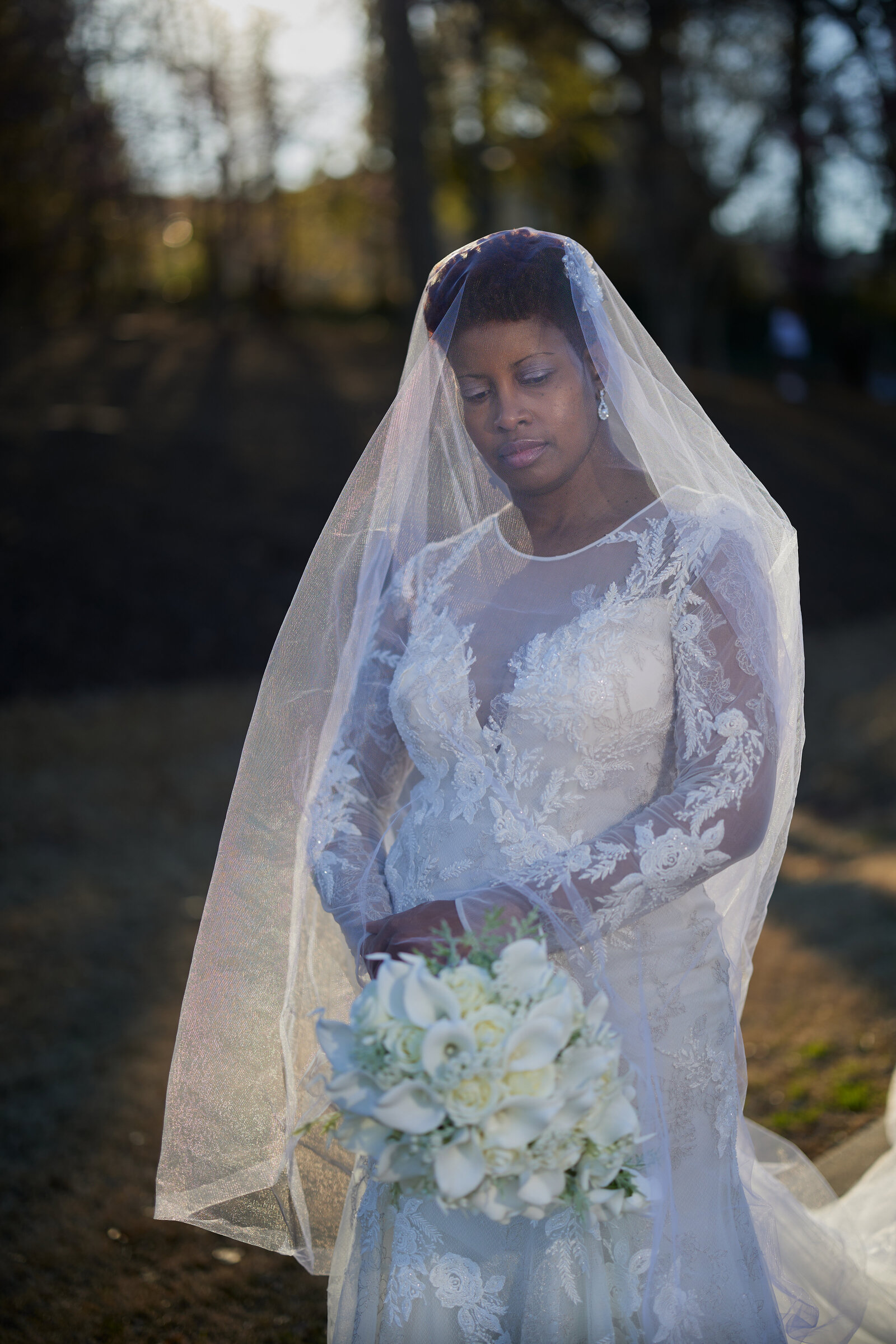 bride stding in the sun