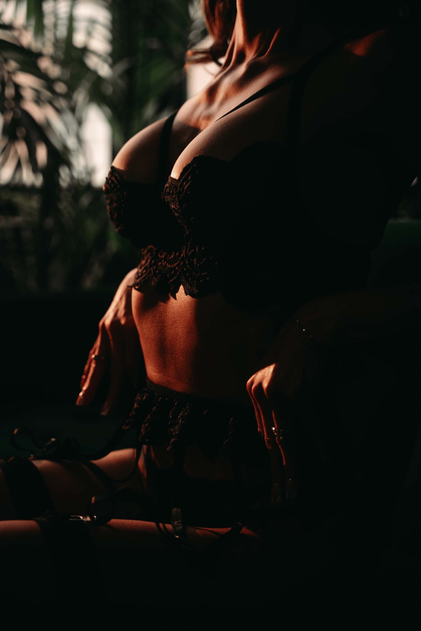 Empowering boudoir portrait of a woman in Kansas City studio