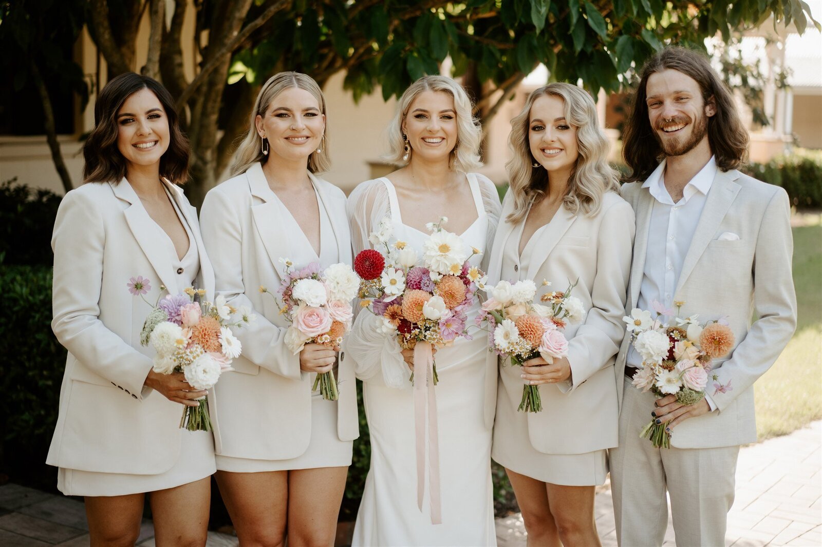 Bella Rae Bride Erin with soft glam makeup and soft waves walking with her husband sam at Bramblewood Farm captured by Doe and Deer Photography