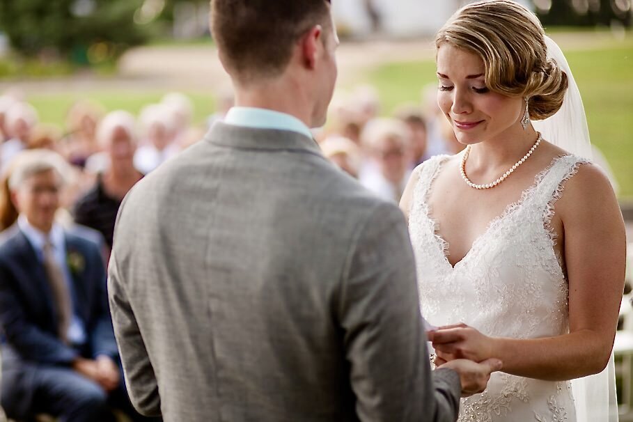 Teary bride reads her vows during wedding ceremony
