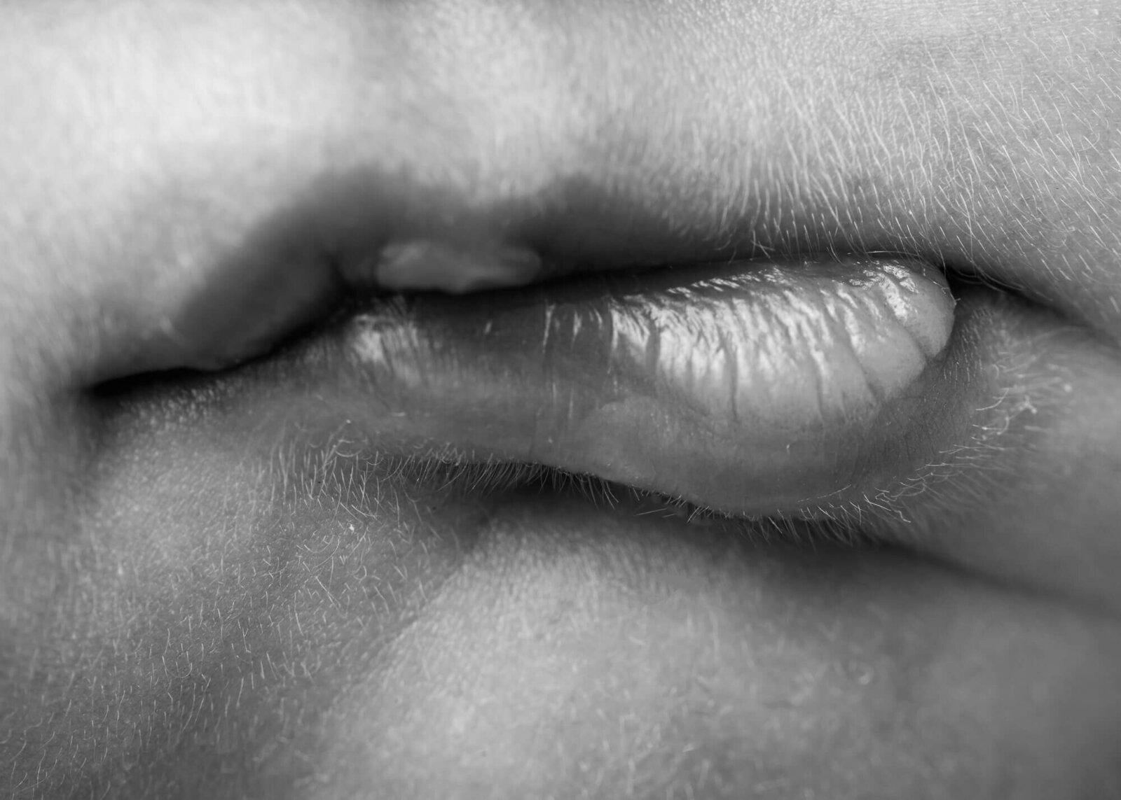 black and white close-up of baby lips