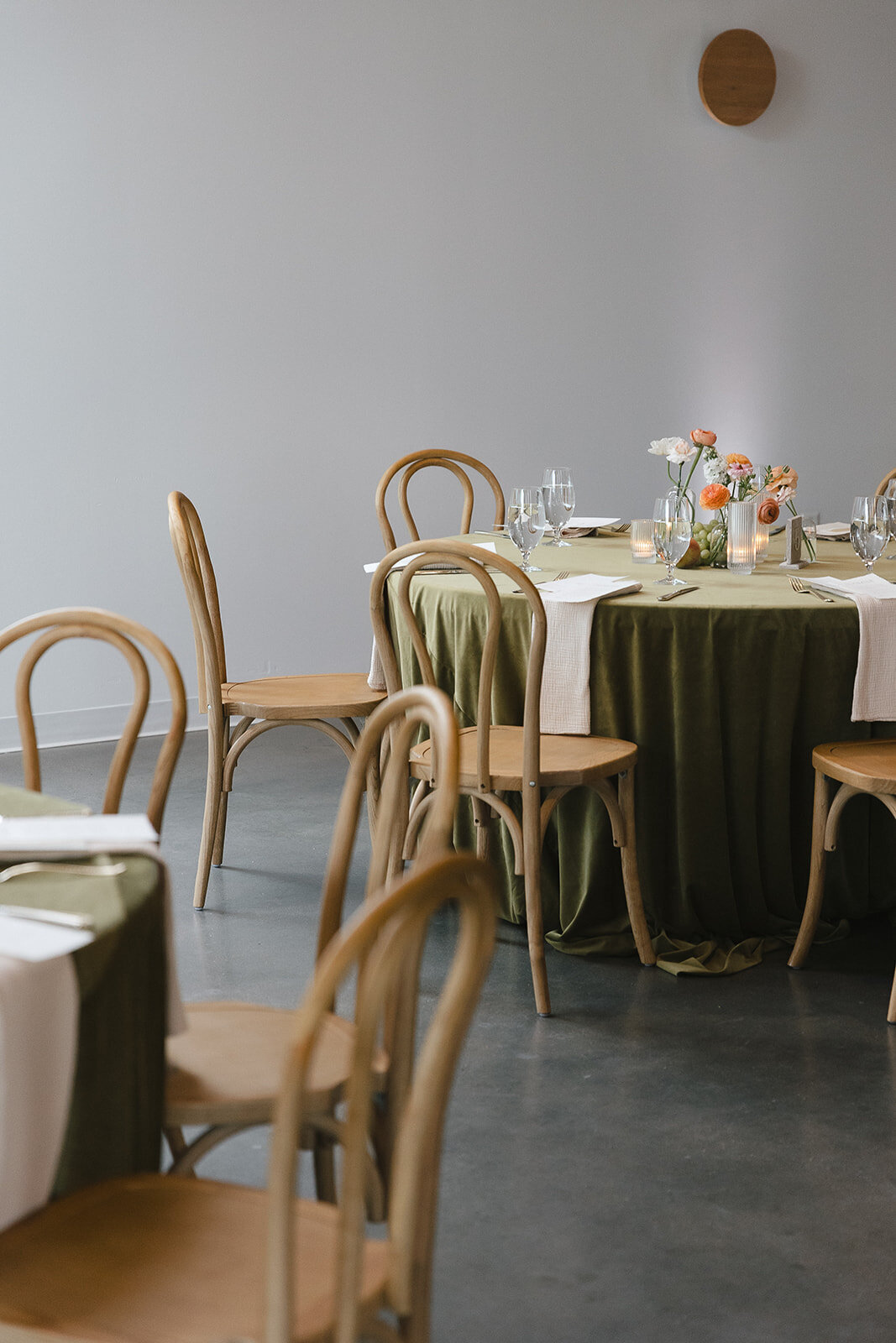 Reception tables and bentwood chairs in The Grand Lady's reception hall