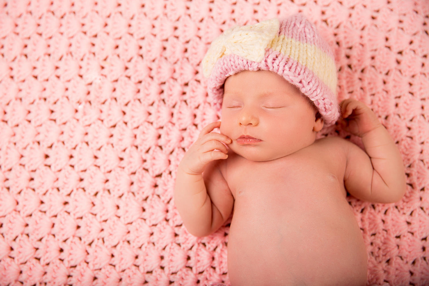 san diego photography | newborn girl with cute pink blanket with pink and white hat