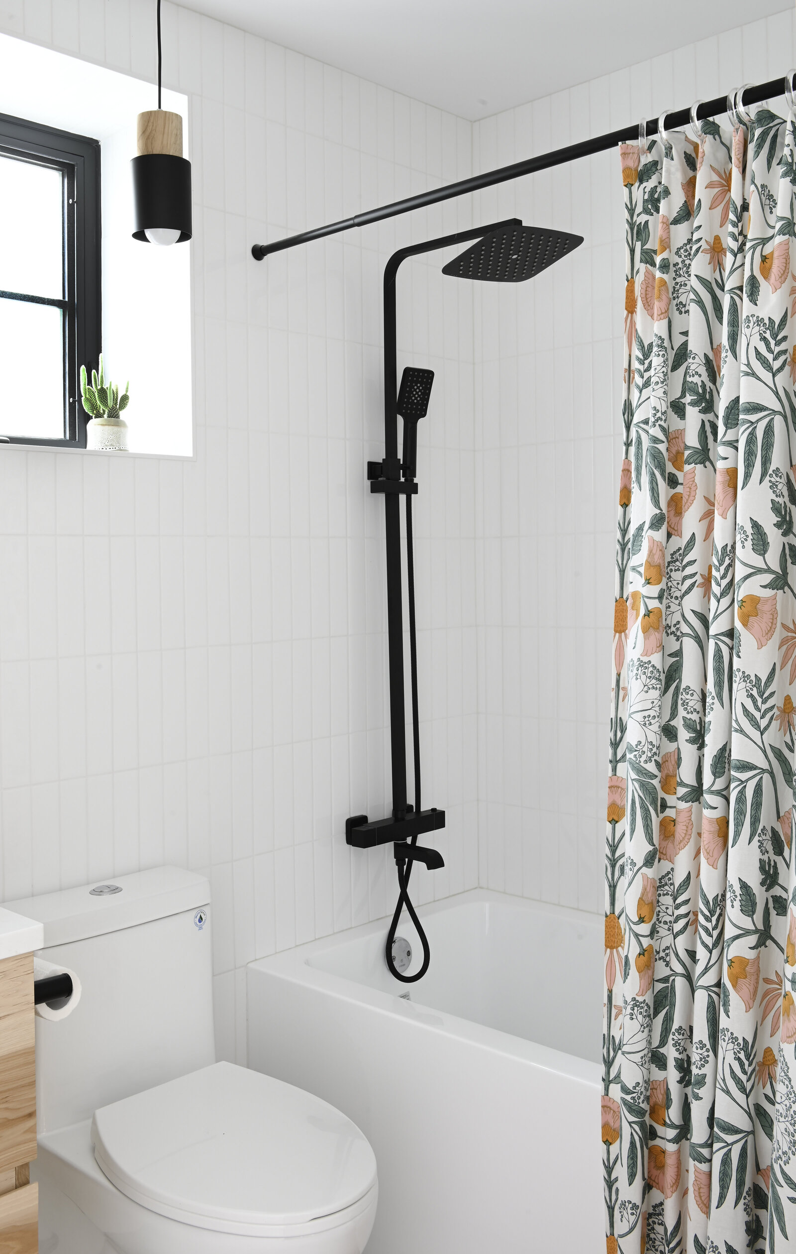 Rebecca Foster Interior Designer small budget shower black faucet