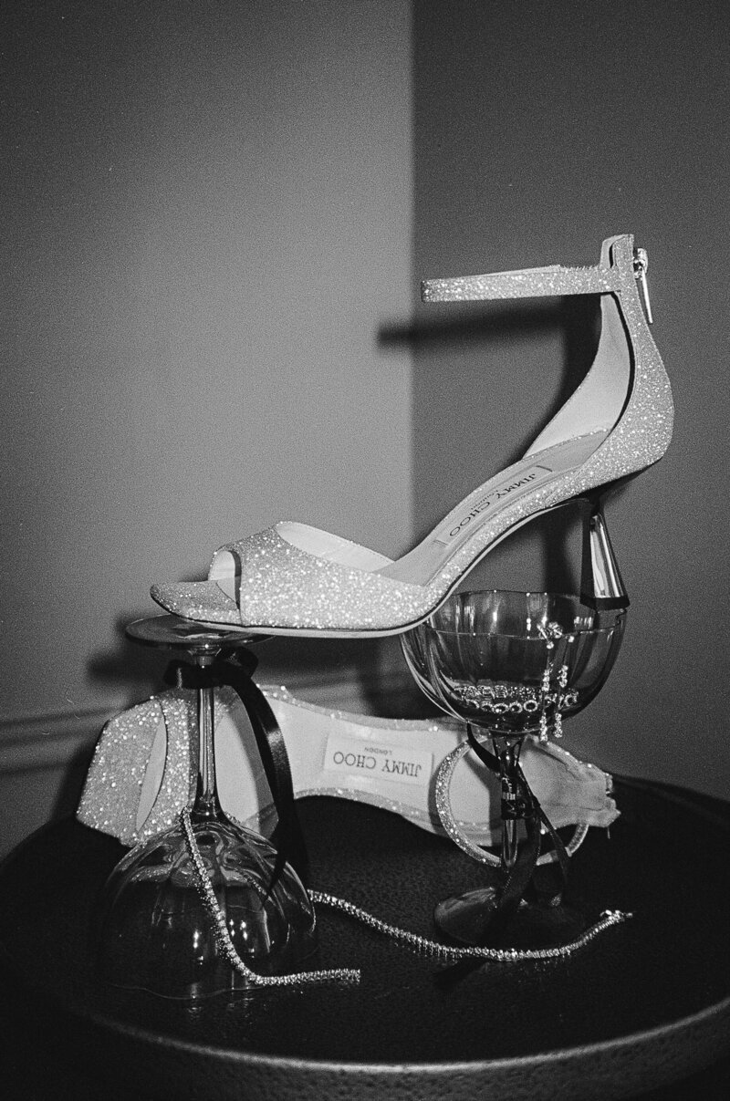 wedding shoes and drink taken by fort myers wedding photographer