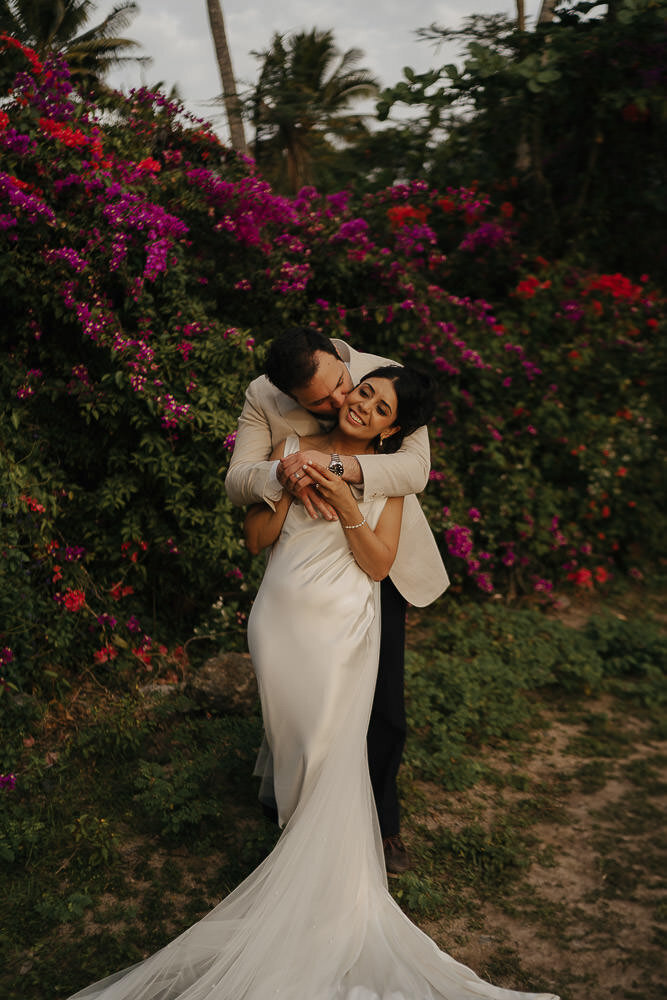 bride and groom cuddling after intercontinental wedding ceremony fiji