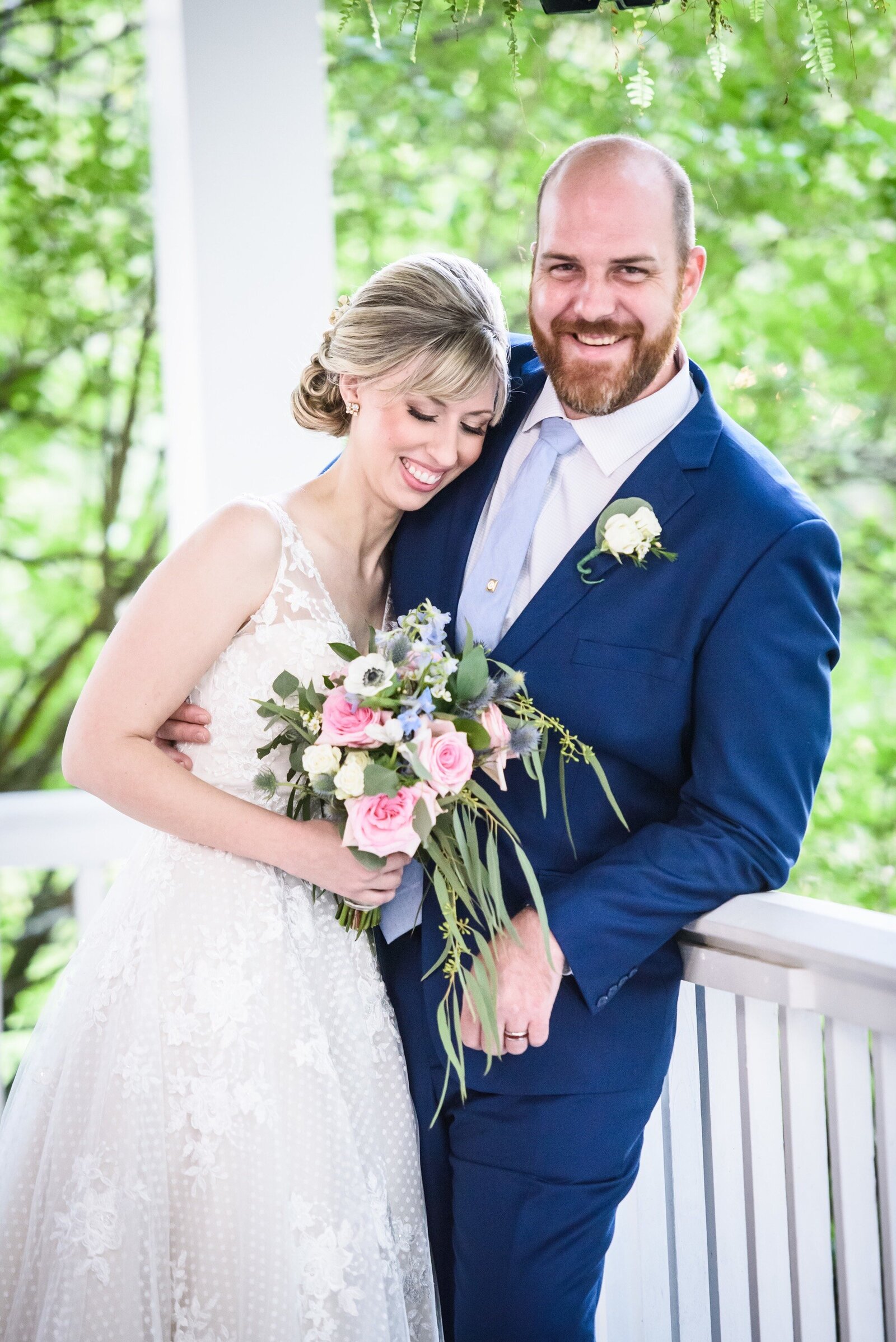 Bride and groom laugh at Compass Point portrait session