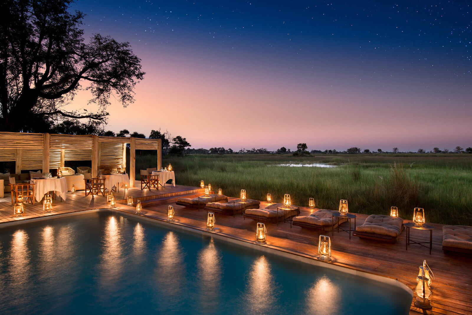 Botswana-Nxabega-Okavango-Tented-Camp-Guest-Area-Deck-dinner-at-the-pool