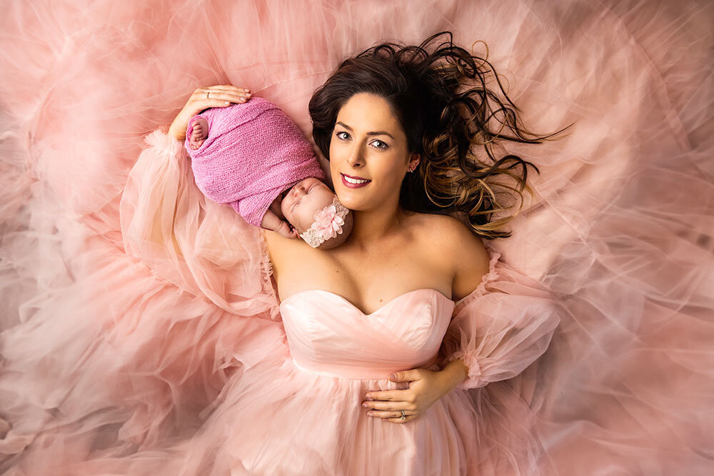 flowing-elegant-pink-tulle-gown-mom-newborn-baby-unique-perspective-timeless-baby-pink-soft-dreamy-flowyjpg